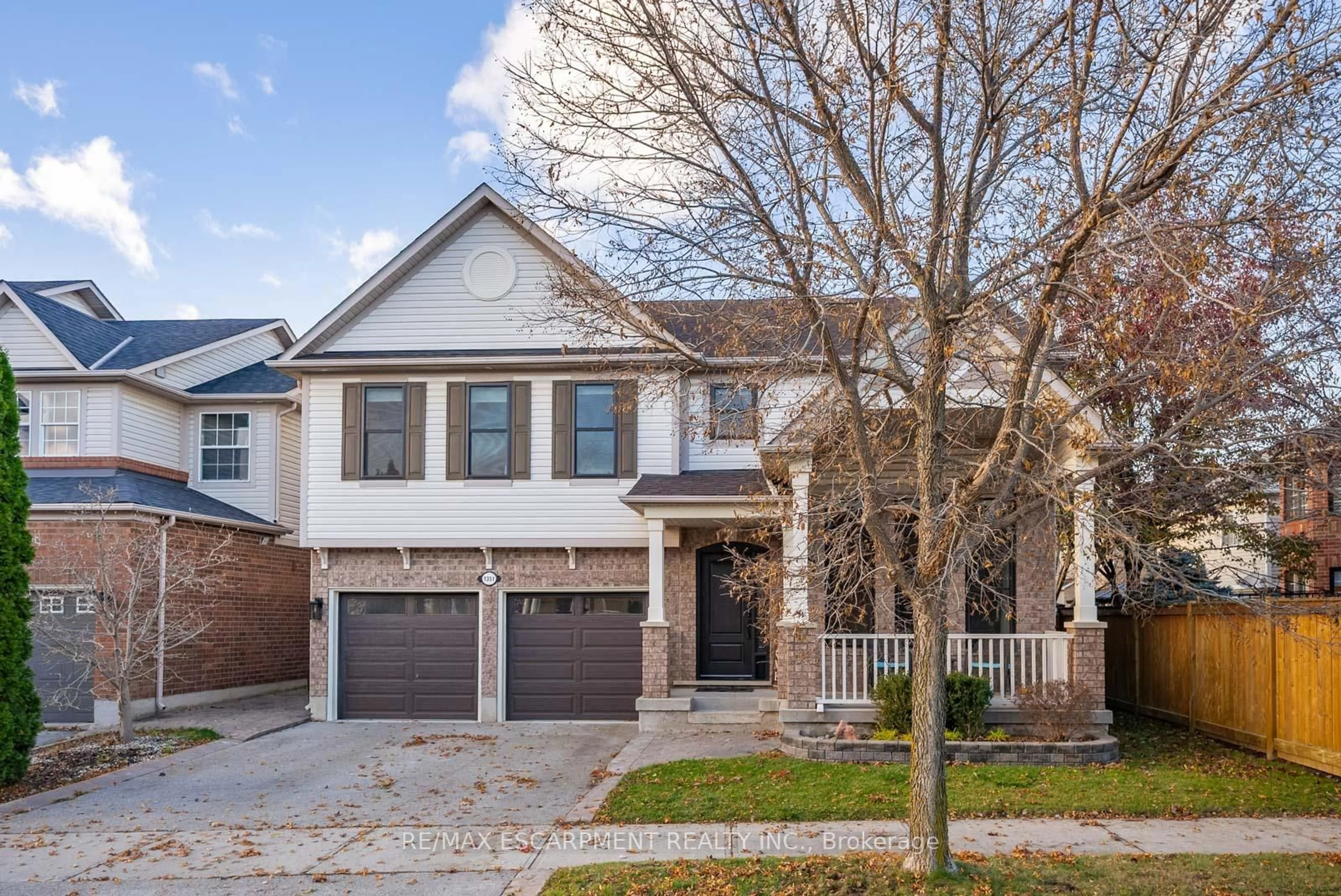 Home with brick exterior material, street for 1351 McGuffin Gate, Milton Ontario L9T 6M3