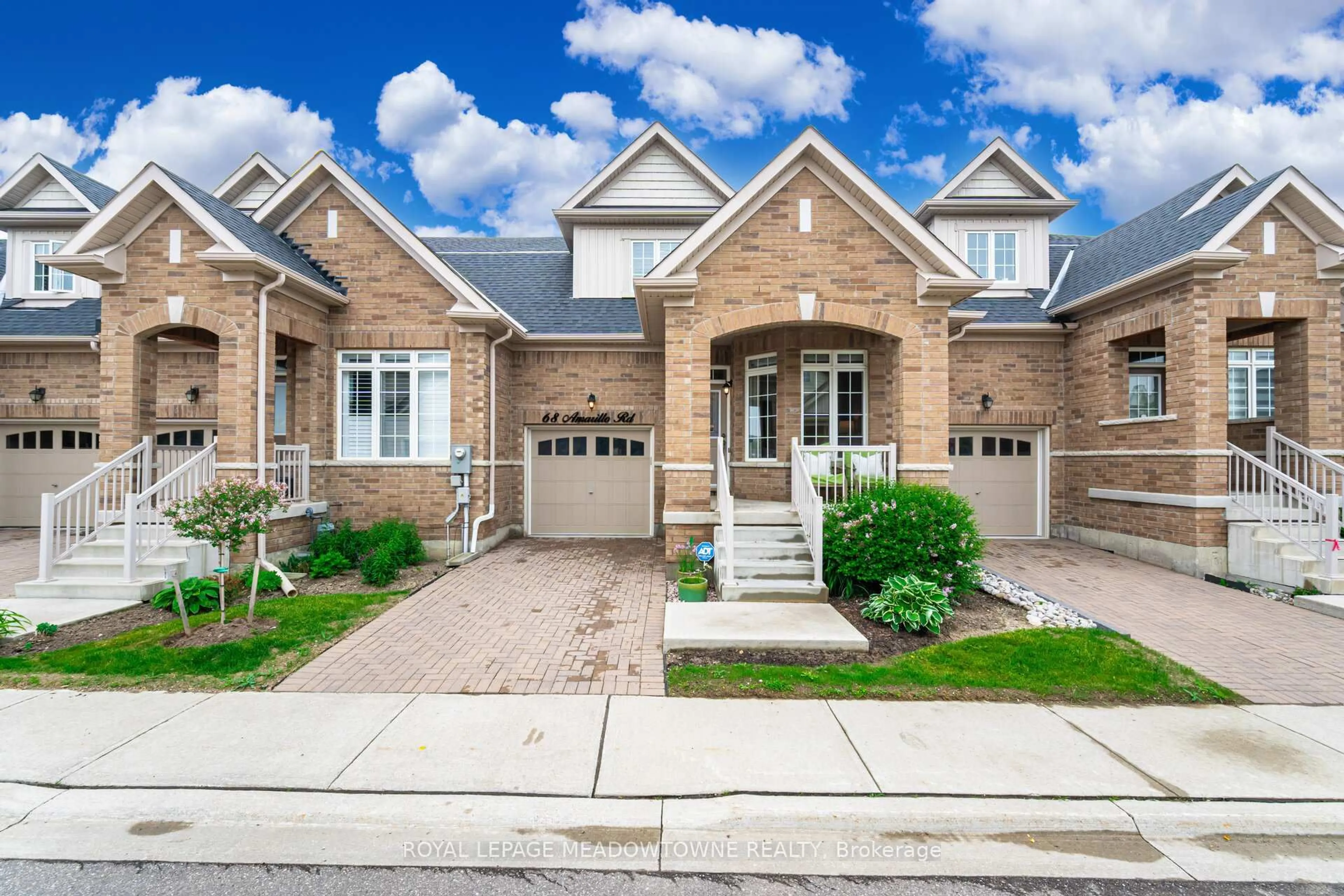 Home with brick exterior material, street for 68 Amarillo Rd, Brampton Ontario L6R 4A5