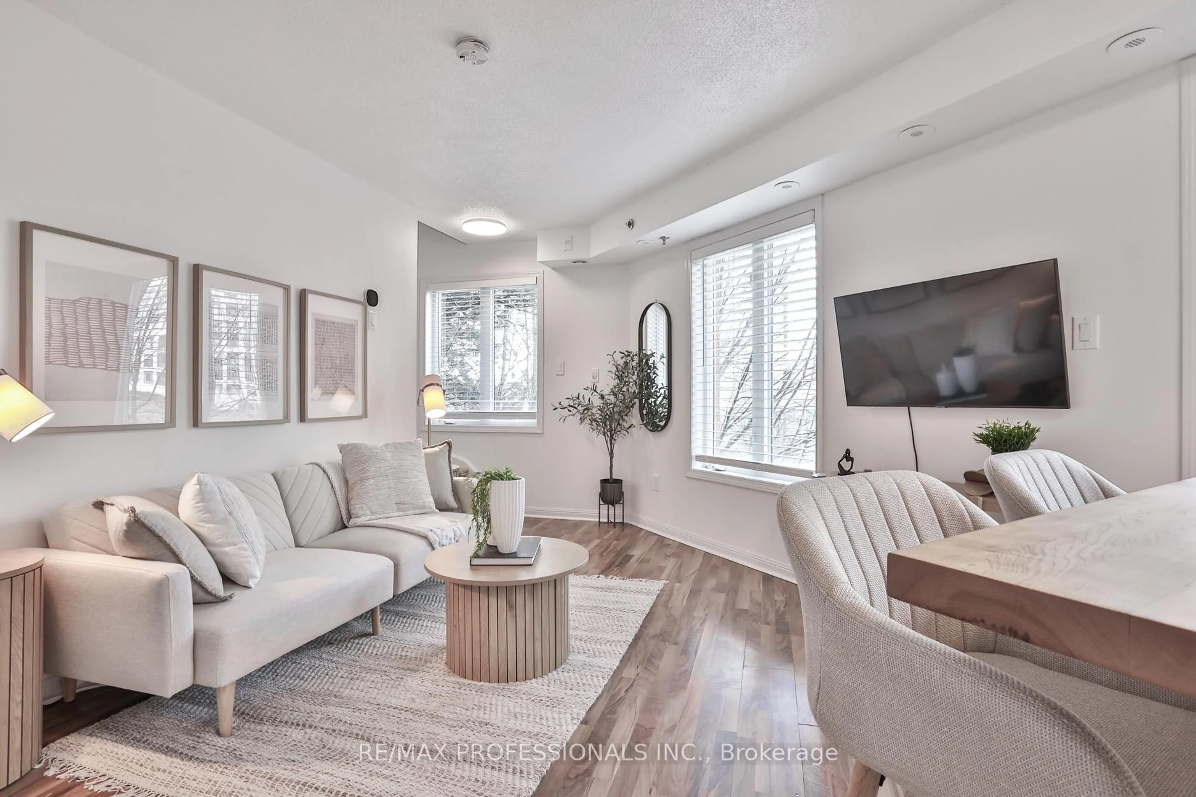 Living room with furniture, unknown for 80 Joe Shuster Way #1706, Toronto Ontario M6K 1Y5