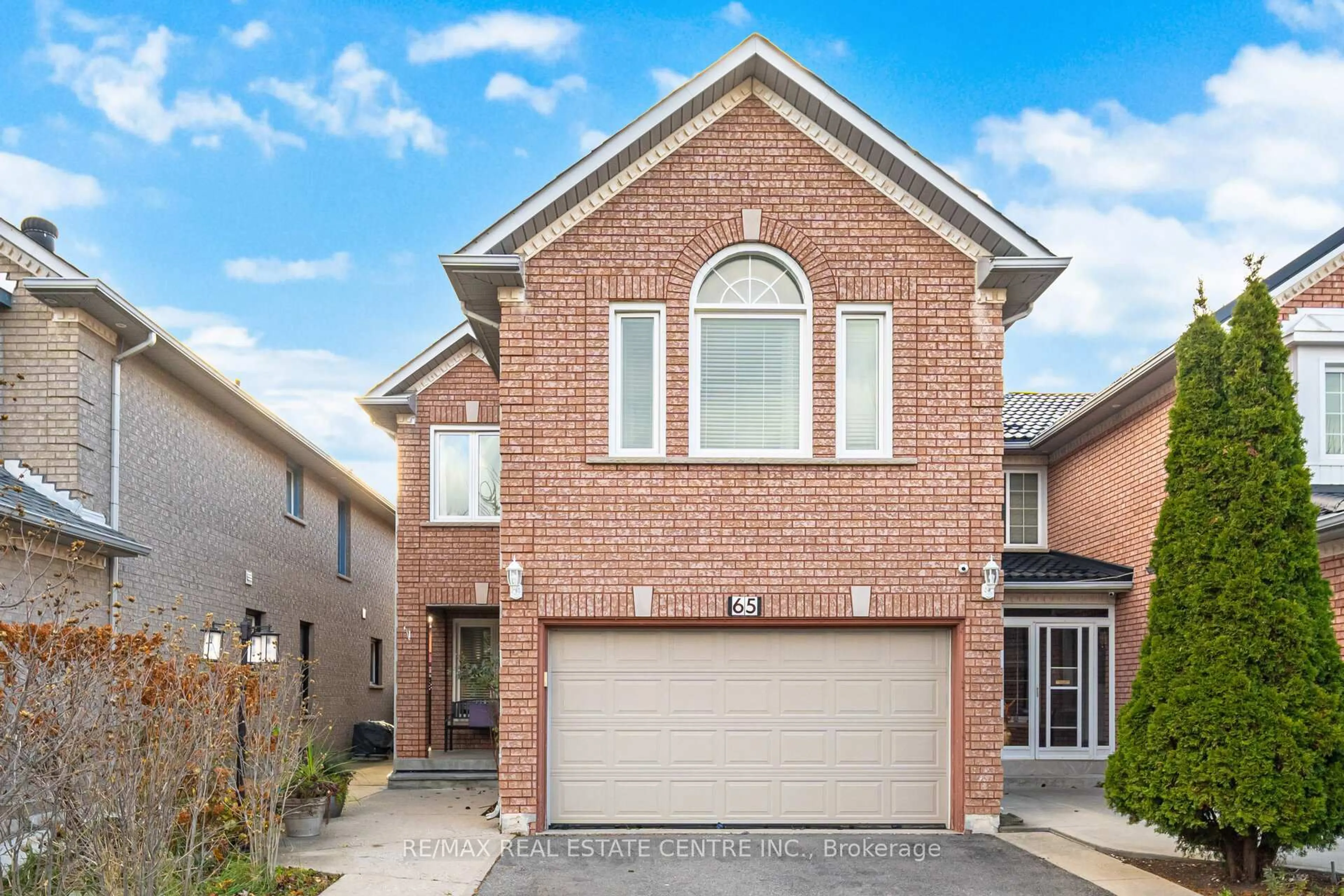 Home with brick exterior material, street for 65 Sahara Tr, Brampton Ontario L6R 1P4