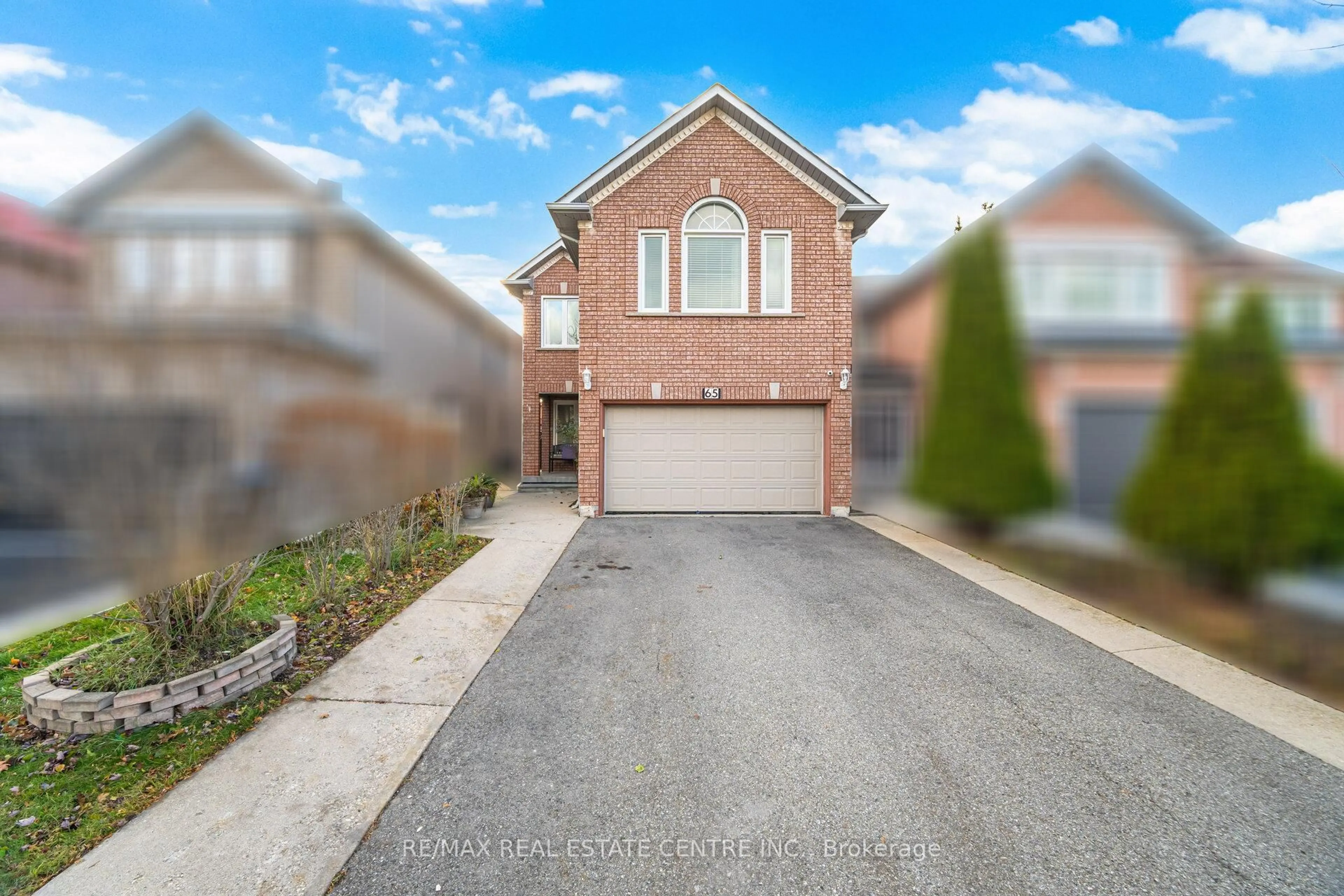 Home with brick exterior material, street for 65 Sahara Tr, Brampton Ontario L6R 1P4