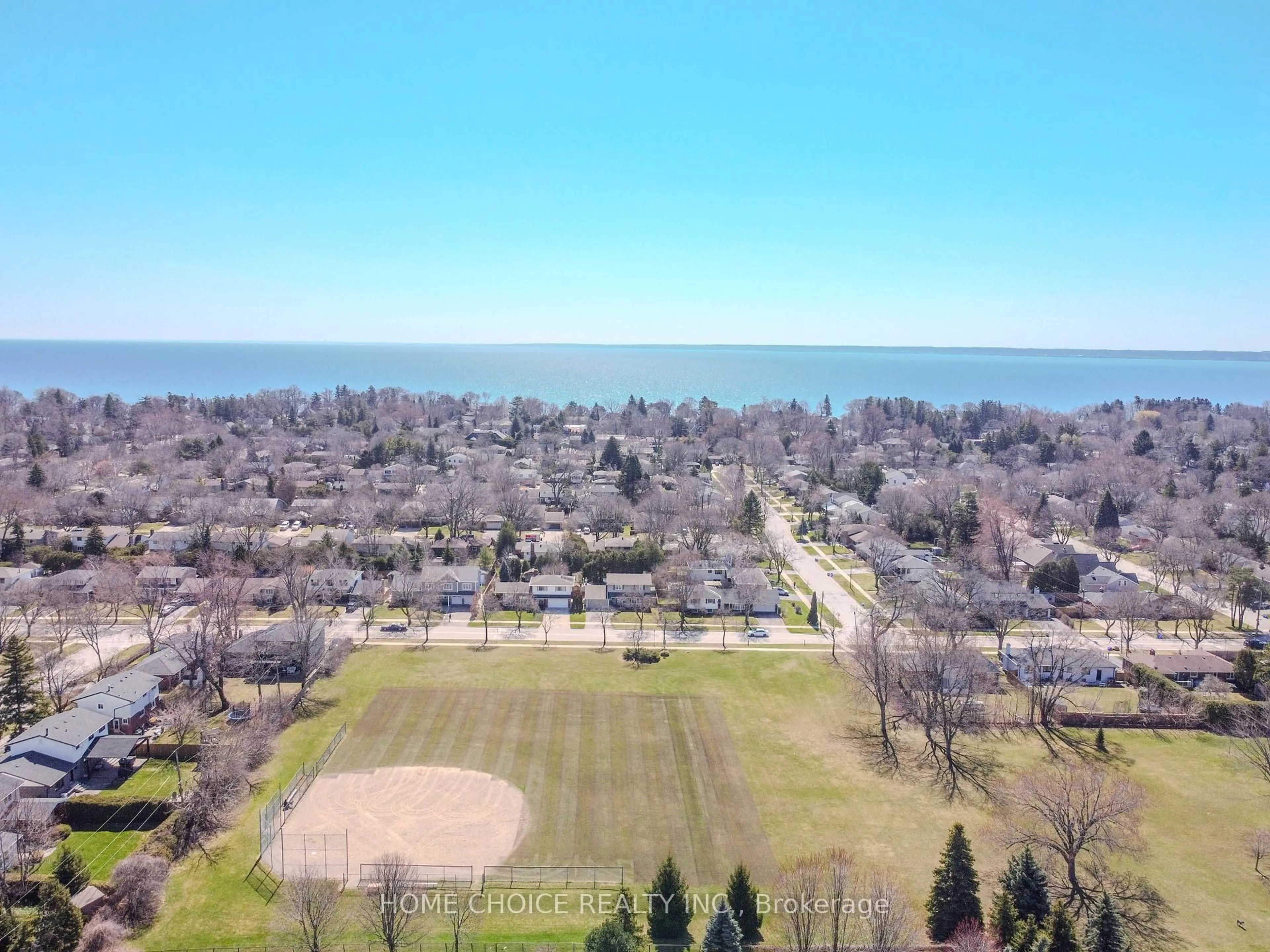 A pic from outside/outdoor area/front of a property/back of a property/a pic from drone, water/lake/river/ocean view for 310 Tuck Dr, Burlington Ontario L7L 2R1