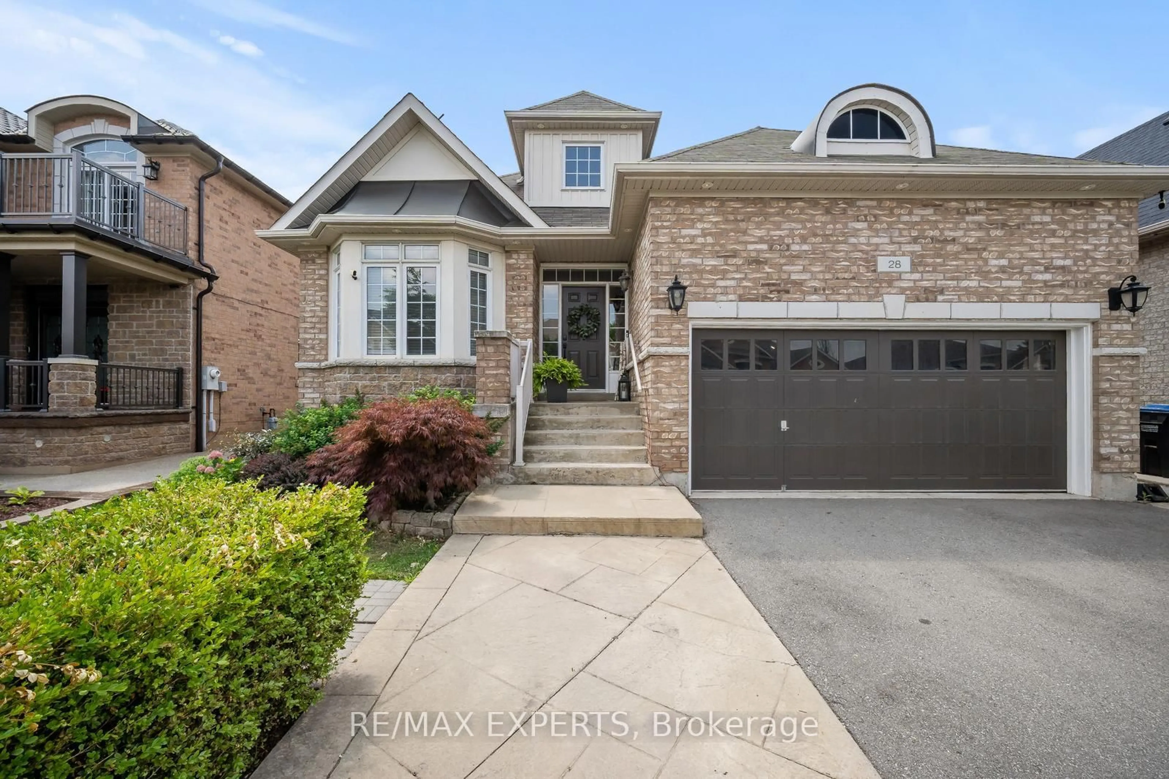 Home with brick exterior material, street for 28 Dokkum Cres, Brampton Ontario L6Z 4T6