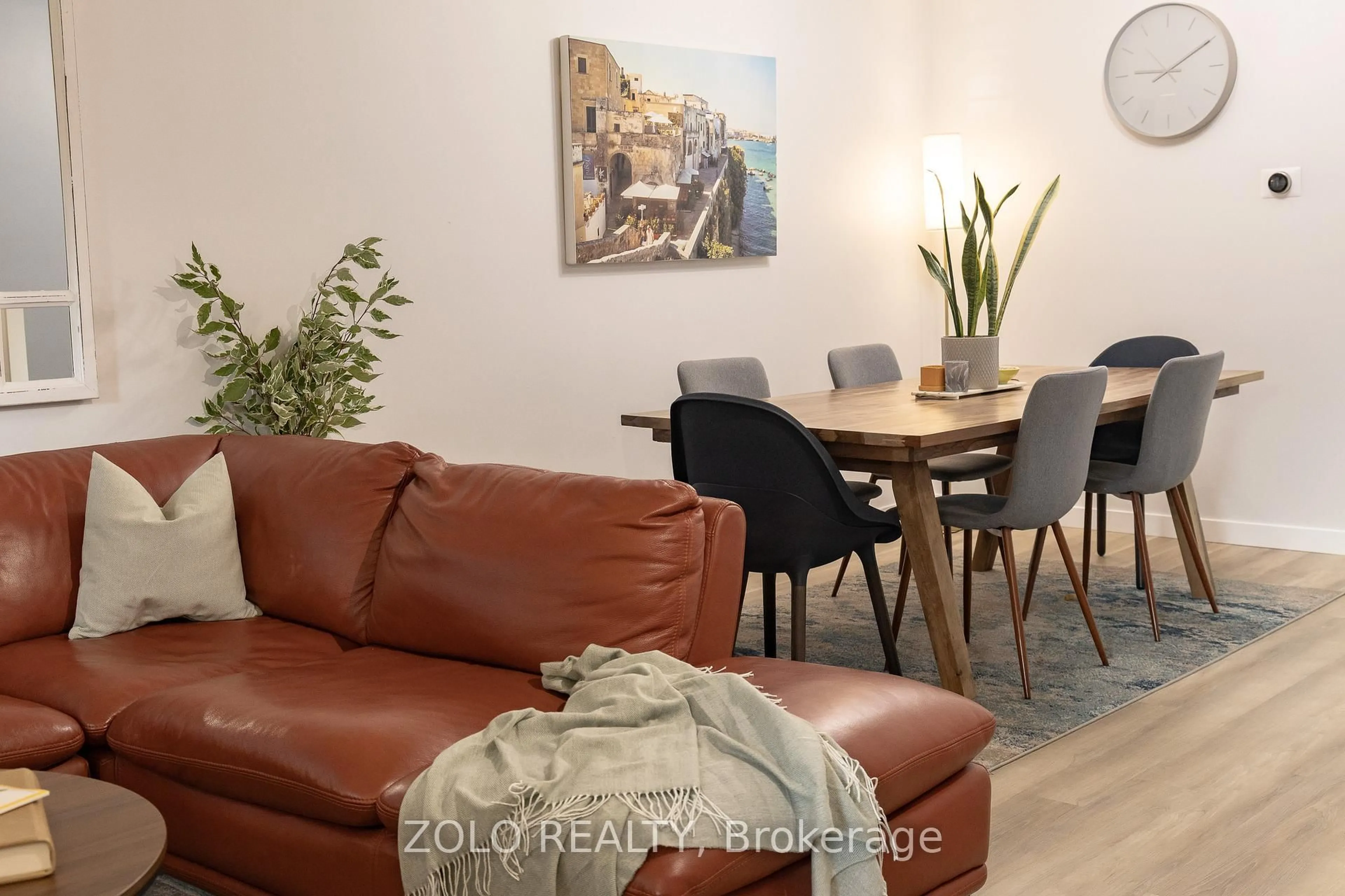 Living room with furniture, wood/laminate floor for 2272 Mowat Ave #45, Oakville Ontario L6H 5L8