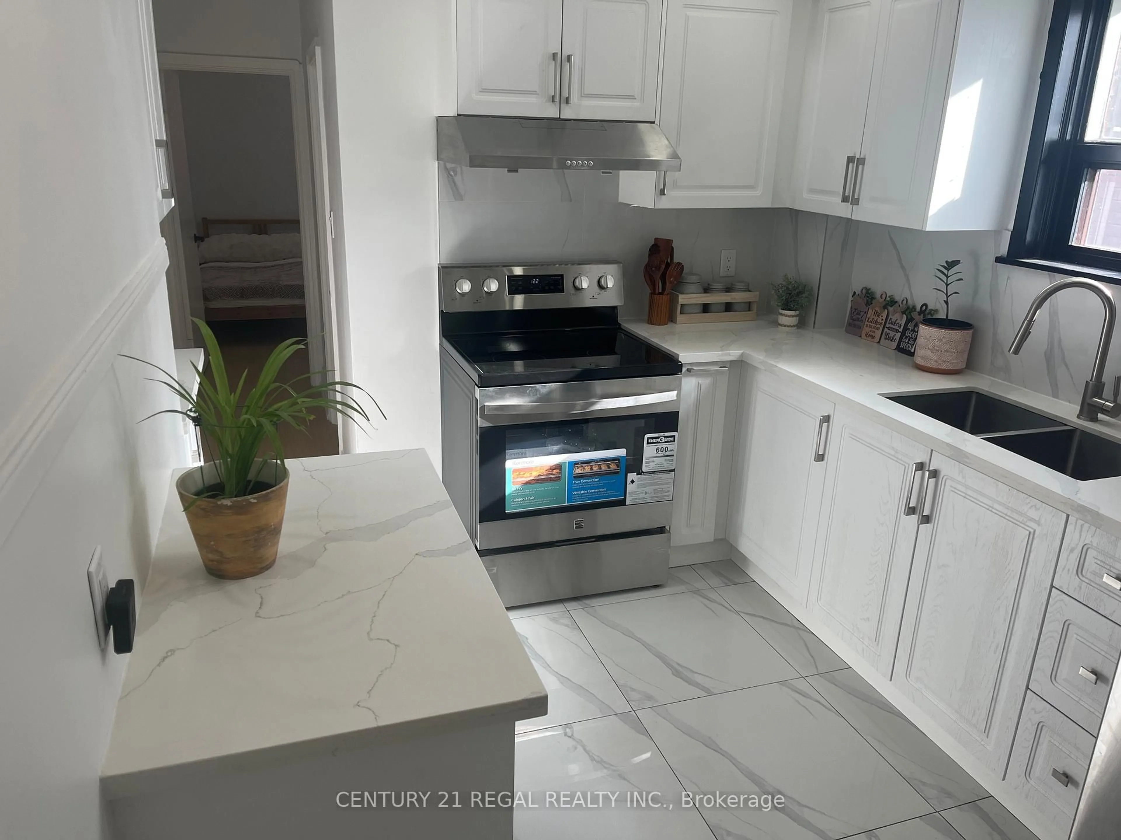 Open concept kitchen, ceramic/tile floor for 45 Fifteenth St, Toronto Ontario M8V 3J3
