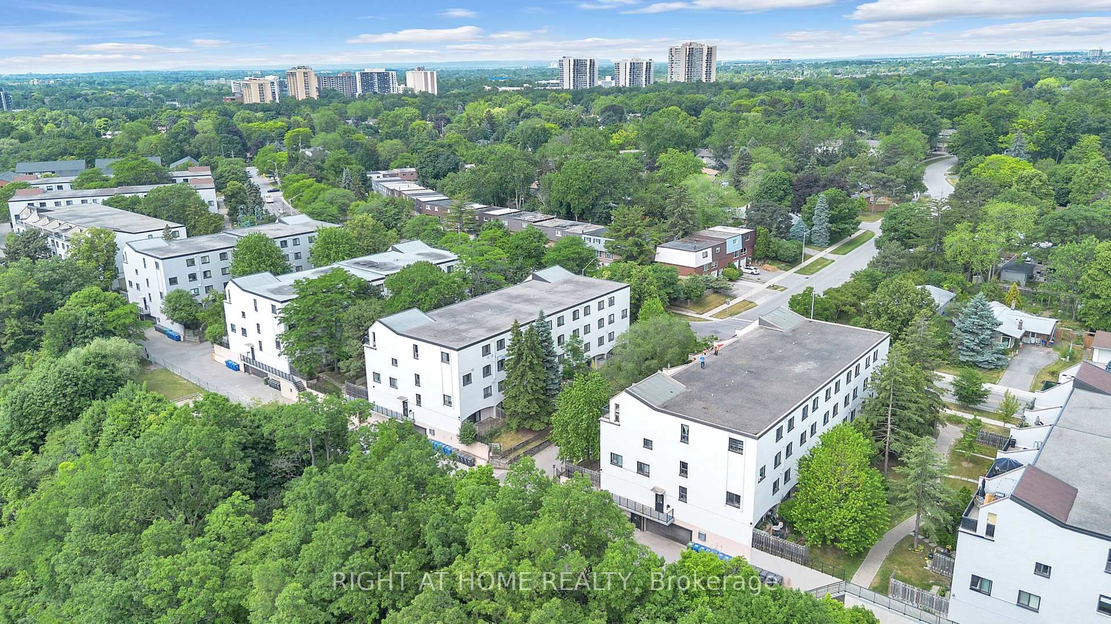 A pic from outside/outdoor area/front of a property/back of a property/a pic from drone, city buildings view from balcony for 1058 Falgarwood Dr #132, Oakville Ontario L6H 2P3