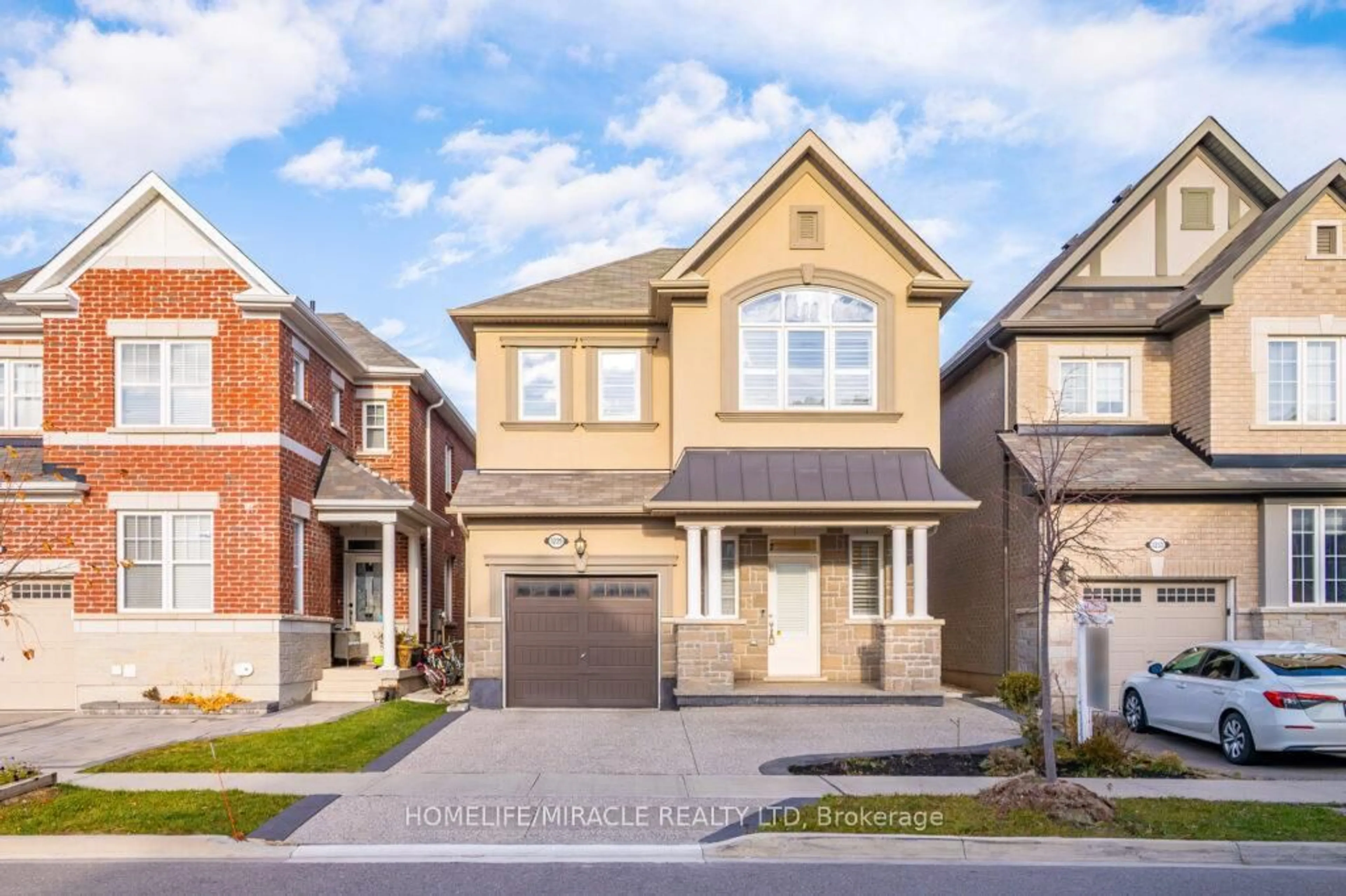 Home with brick exterior material, street for 1229 Rose Way, Milton Ontario L9T 7E7
