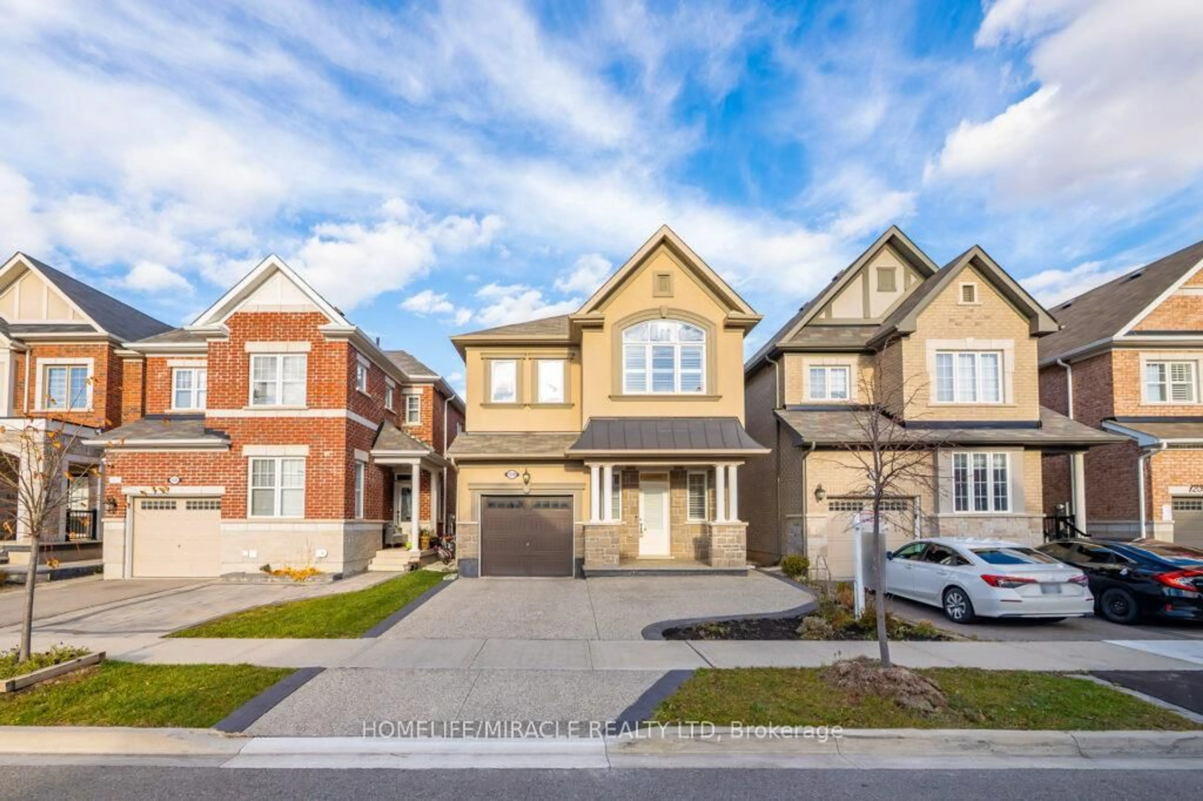 Home with brick exterior material, street for 1229 Rose Way, Milton Ontario L9T 7E7