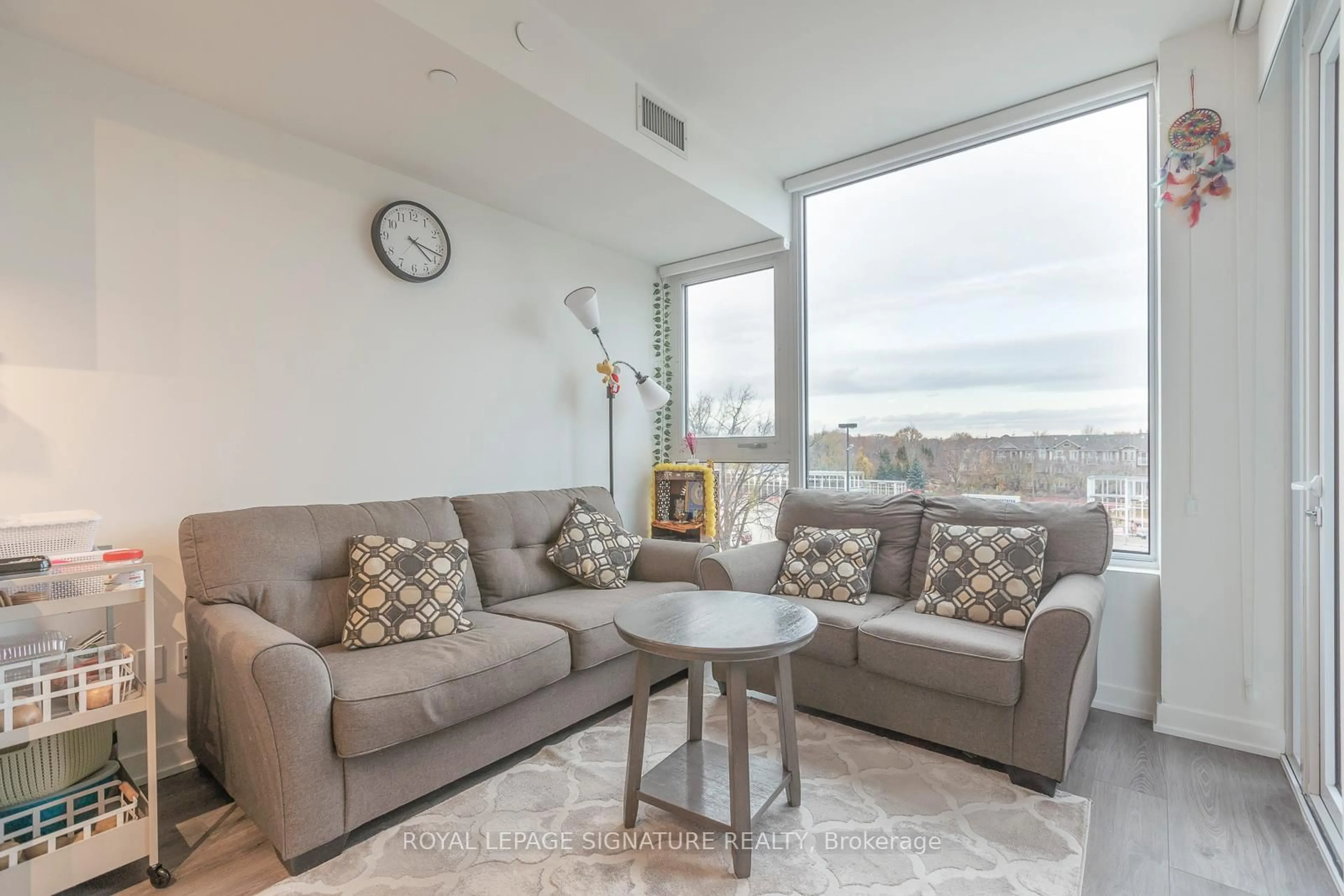 Living room with furniture, unknown for 28 Ann St #303, Mississauga Ontario L5G 0E1