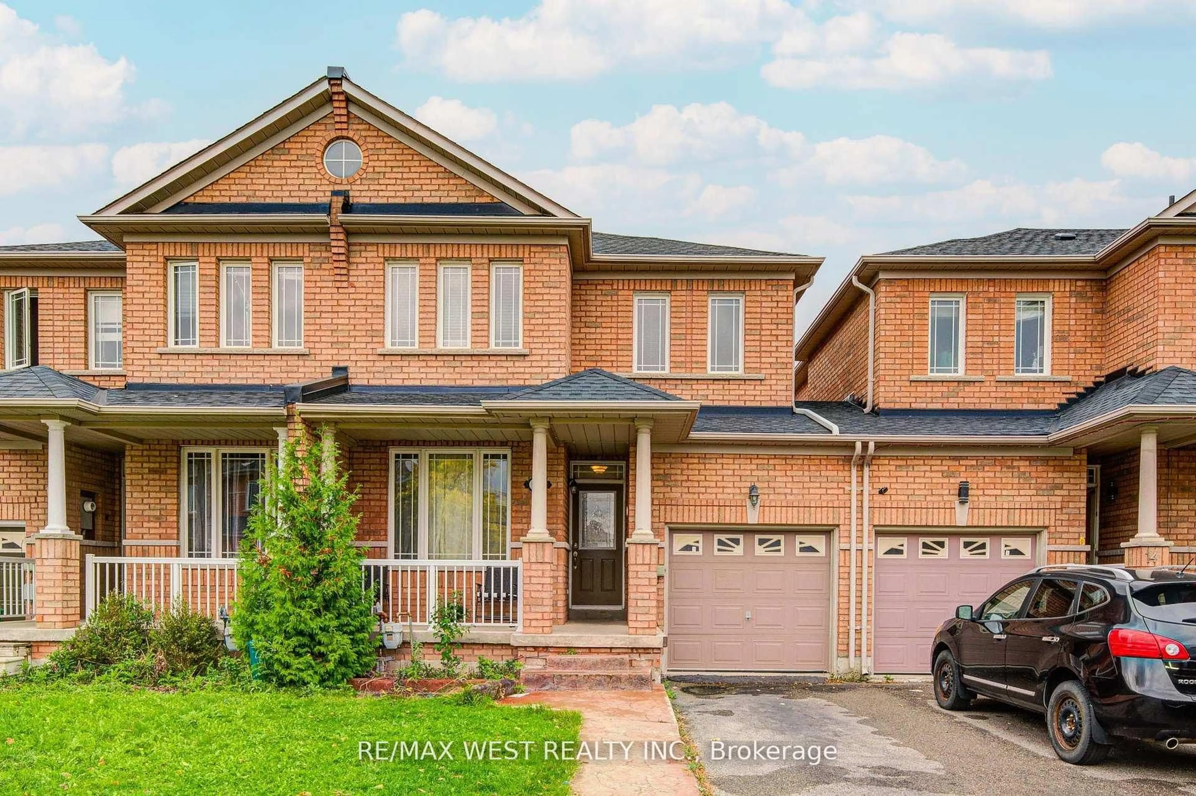 Home with brick exterior material, street for 12 Eaglefield Gate, Brampton Ontario L7A 3S2