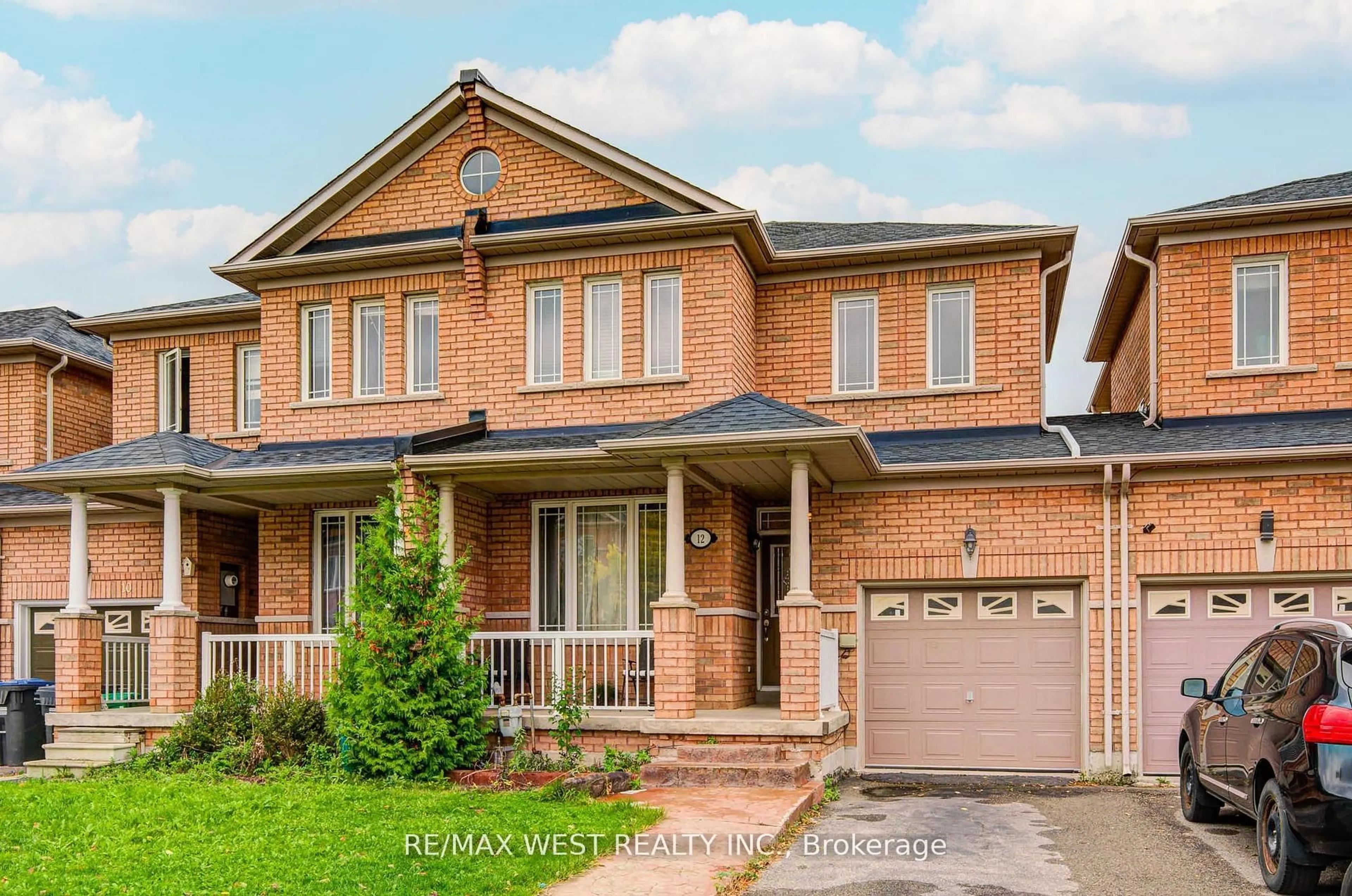 Home with brick exterior material, street for 12 Eaglefield Gate, Brampton Ontario L7A 3S2