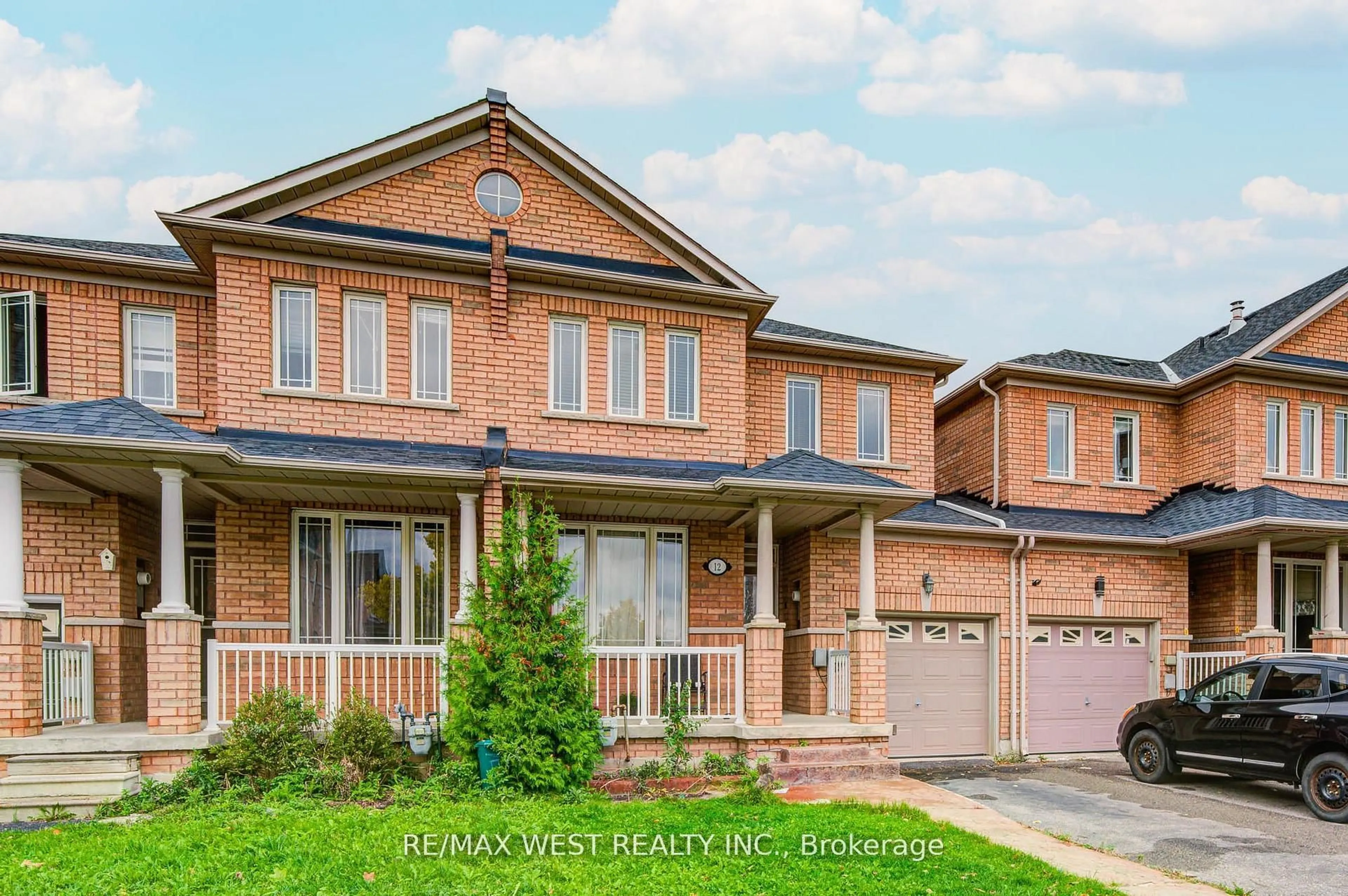 Home with brick exterior material, street for 12 Eaglefield Gate, Brampton Ontario L7A 3S2