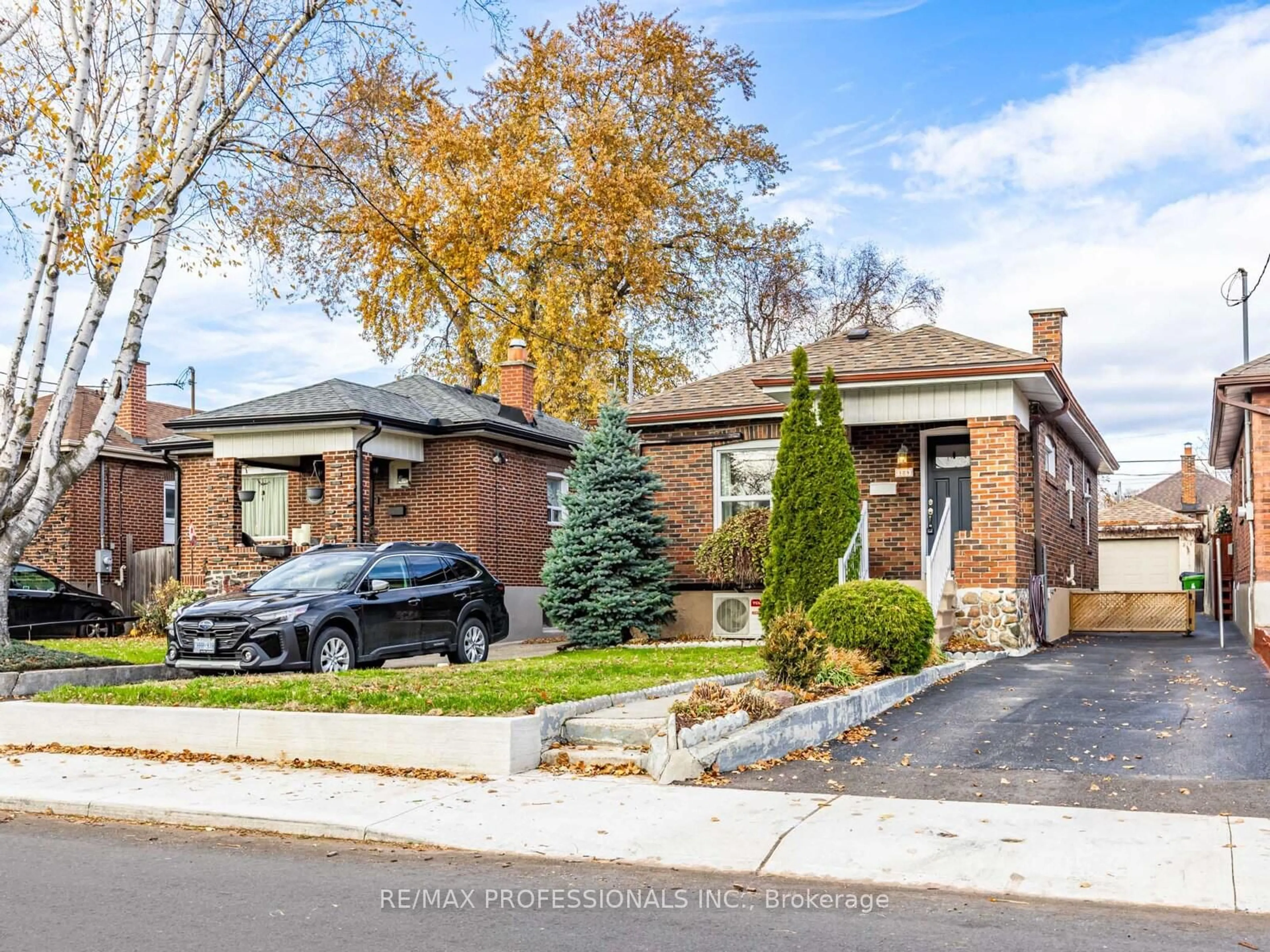 Home with brick exterior material, street for 124 Foxwell St, Toronto Ontario M6N 1Z6