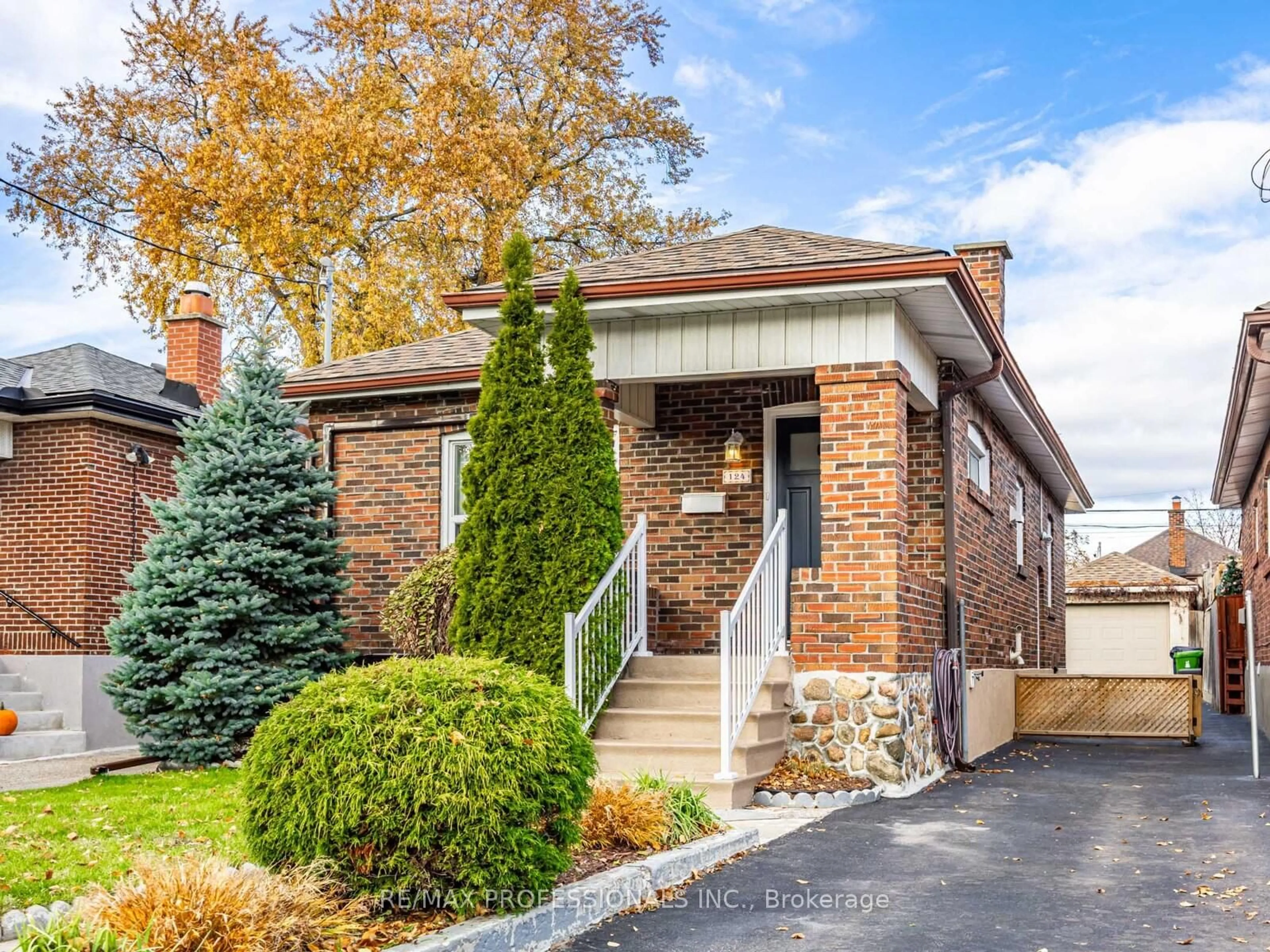Home with brick exterior material, street for 124 Foxwell St, Toronto Ontario M6N 1Z6