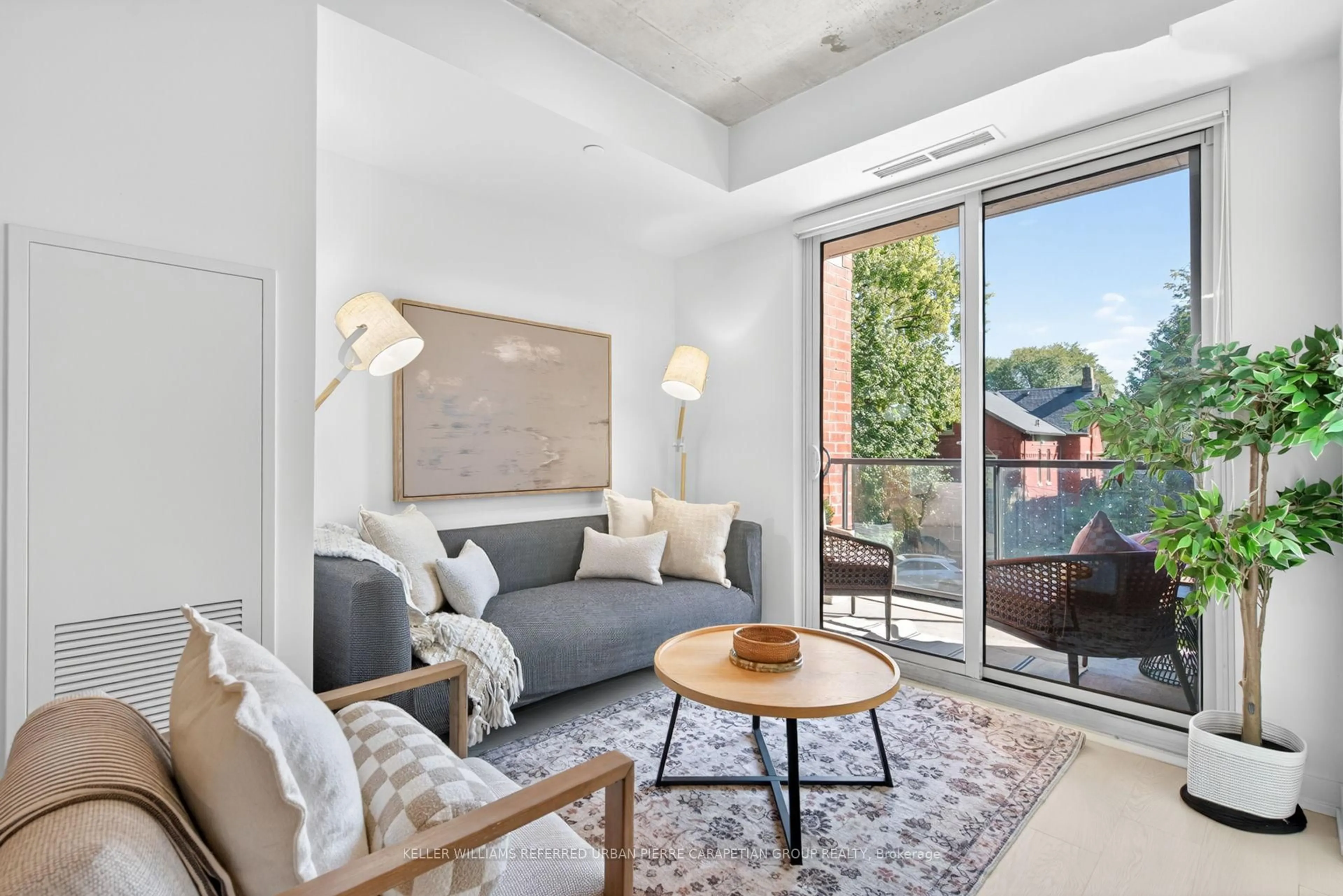 Living room with furniture, unknown for 57 Brock Ave #215, Toronto Ontario M3H 3N2