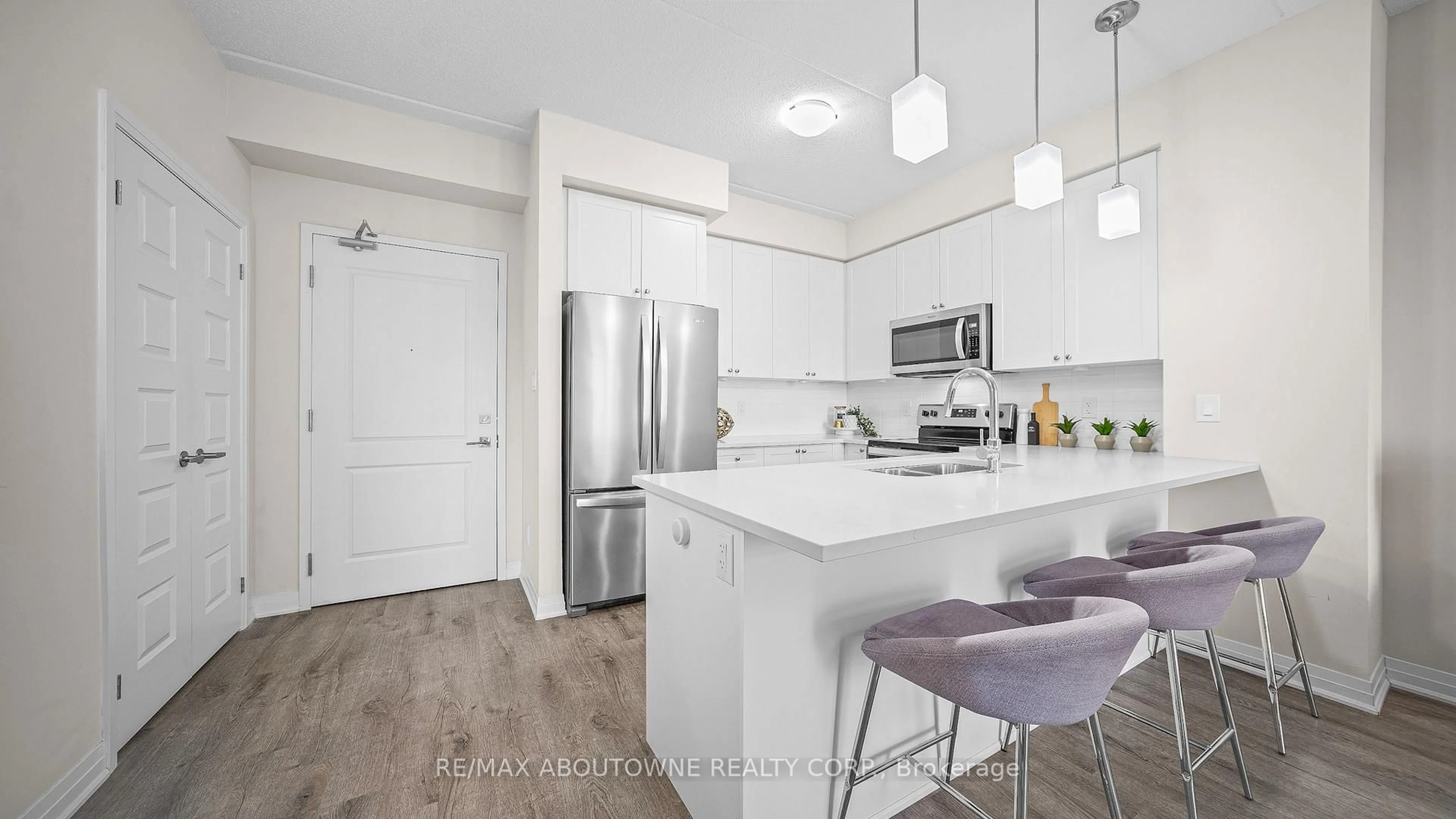 Open concept kitchen, unknown for 610 Farmstead Dr #304, Milton Ontario L9T 7W2