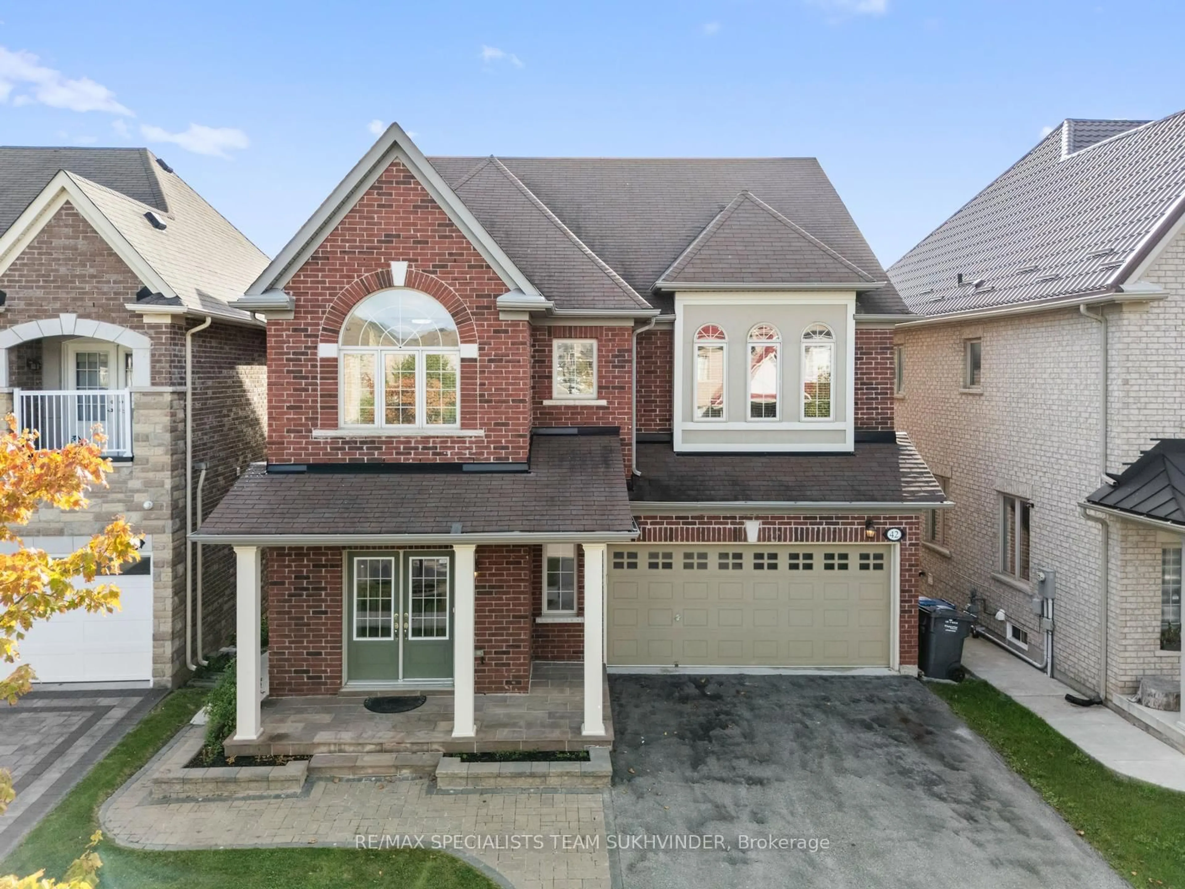 Home with brick exterior material, street for 42 Arrowpoint Dr, Brampton Ontario L6Y 0Y8