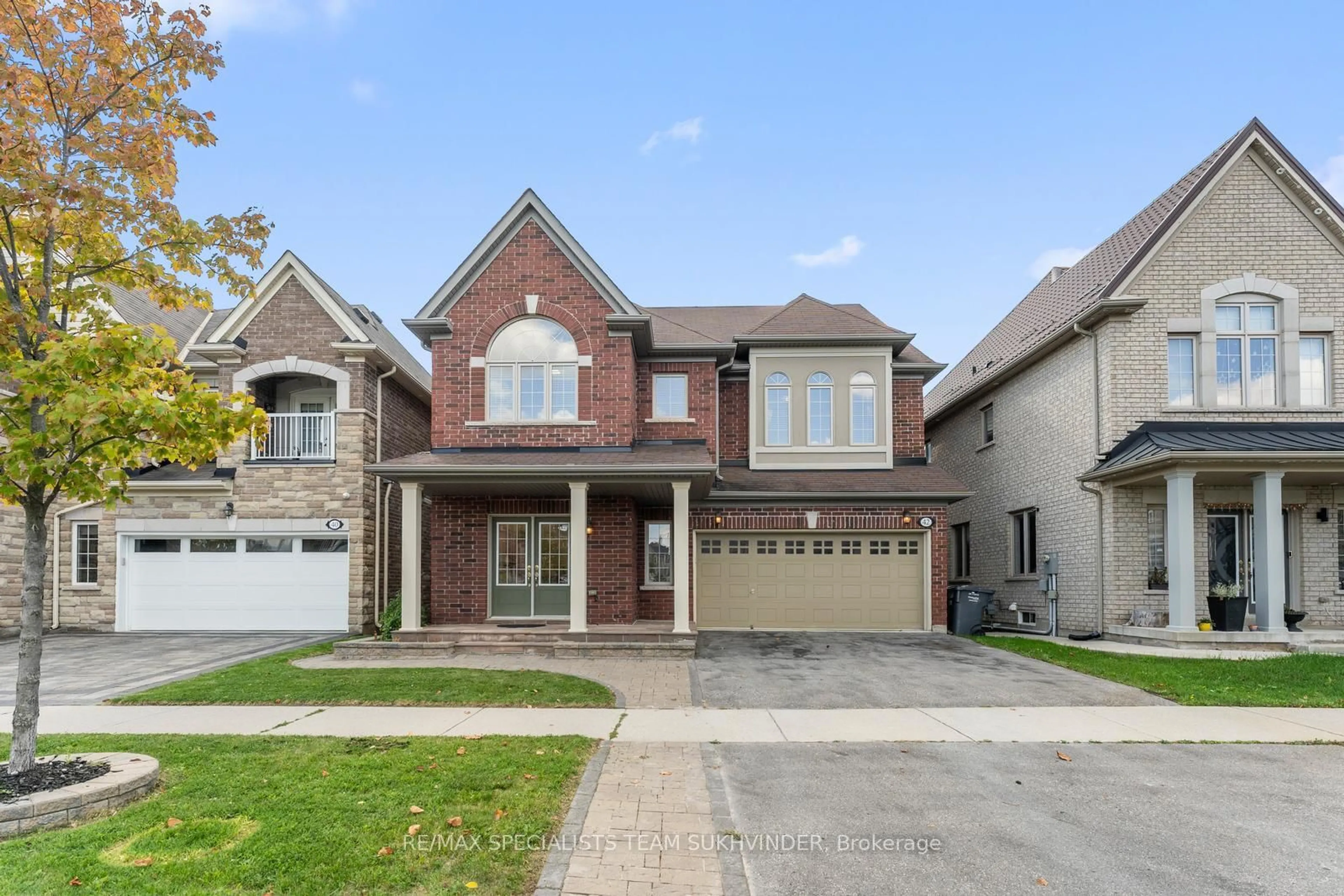 Home with brick exterior material, street for 42 Arrowpoint Dr, Brampton Ontario L6Y 0Y8