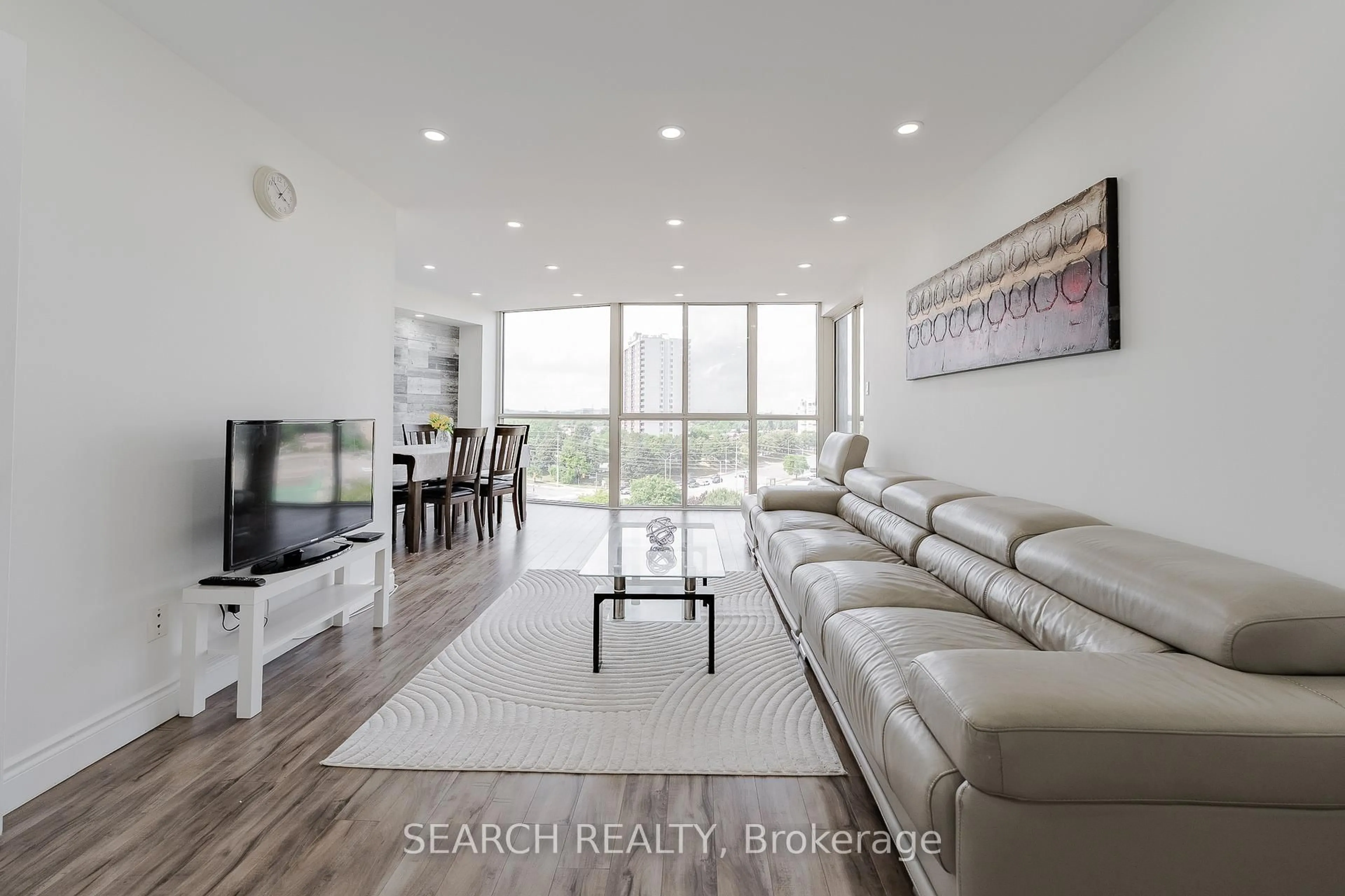 Living room with furniture, unknown for 1360 Rathburn Rd #906, Mississauga Ontario L4W 4H4