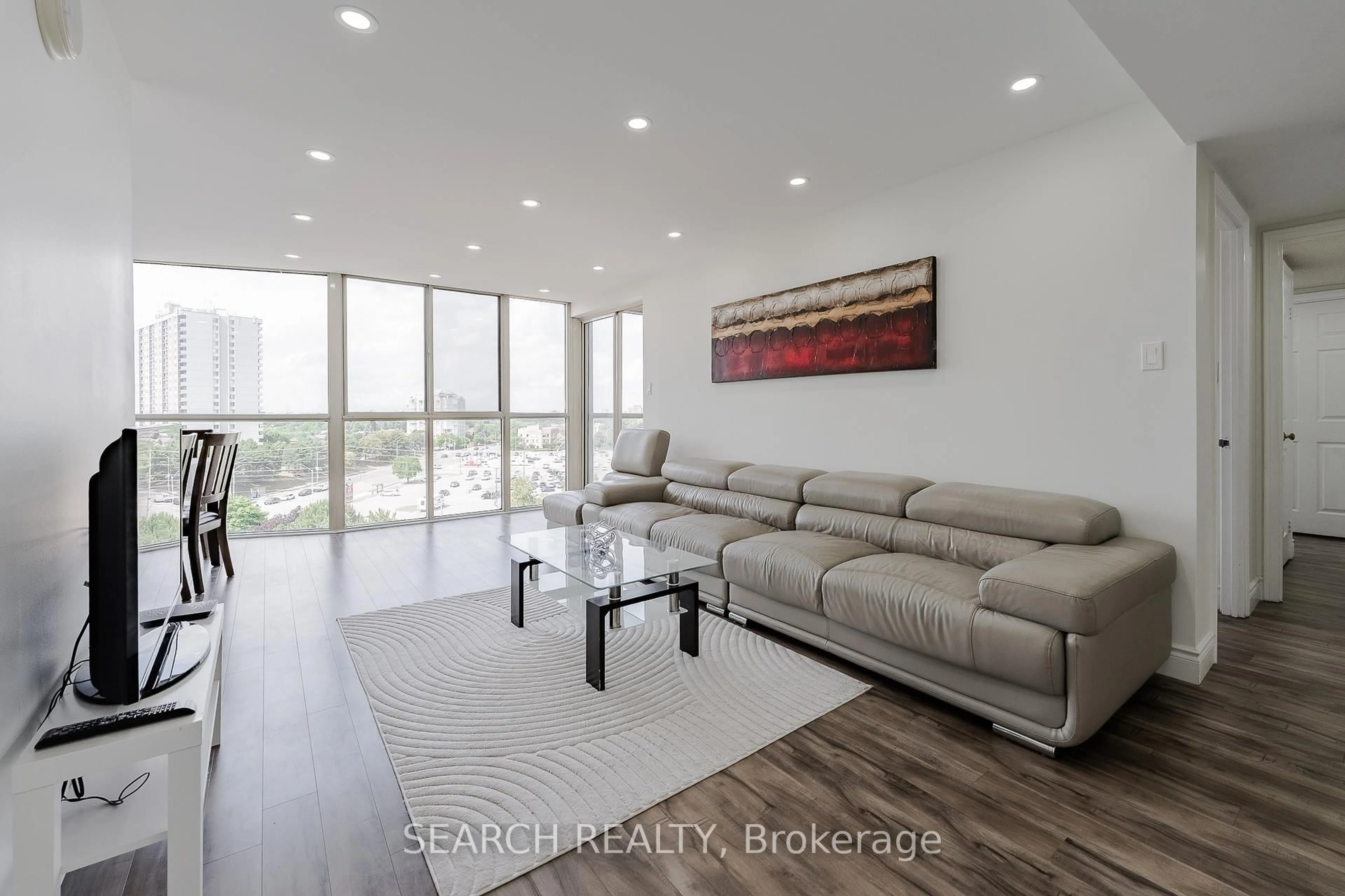 Living room with furniture, unknown for 1360 Rathburn Rd #906, Mississauga Ontario L4W 4H4