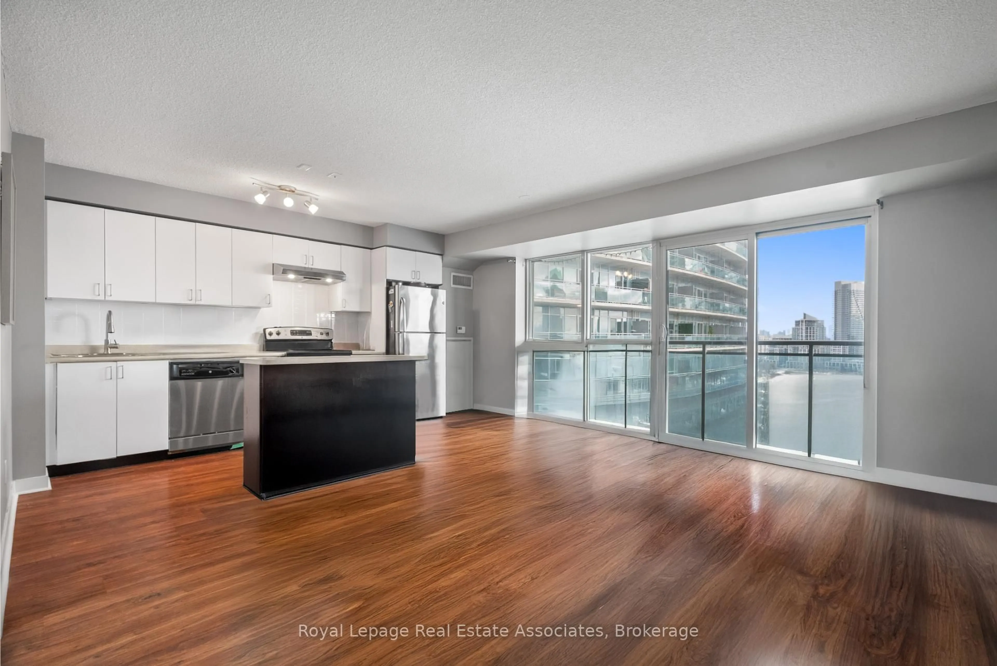 Open concept kitchen, wood/laminate floor for 155 Legion Rd #1601, Toronto Ontario M8Y 0A7