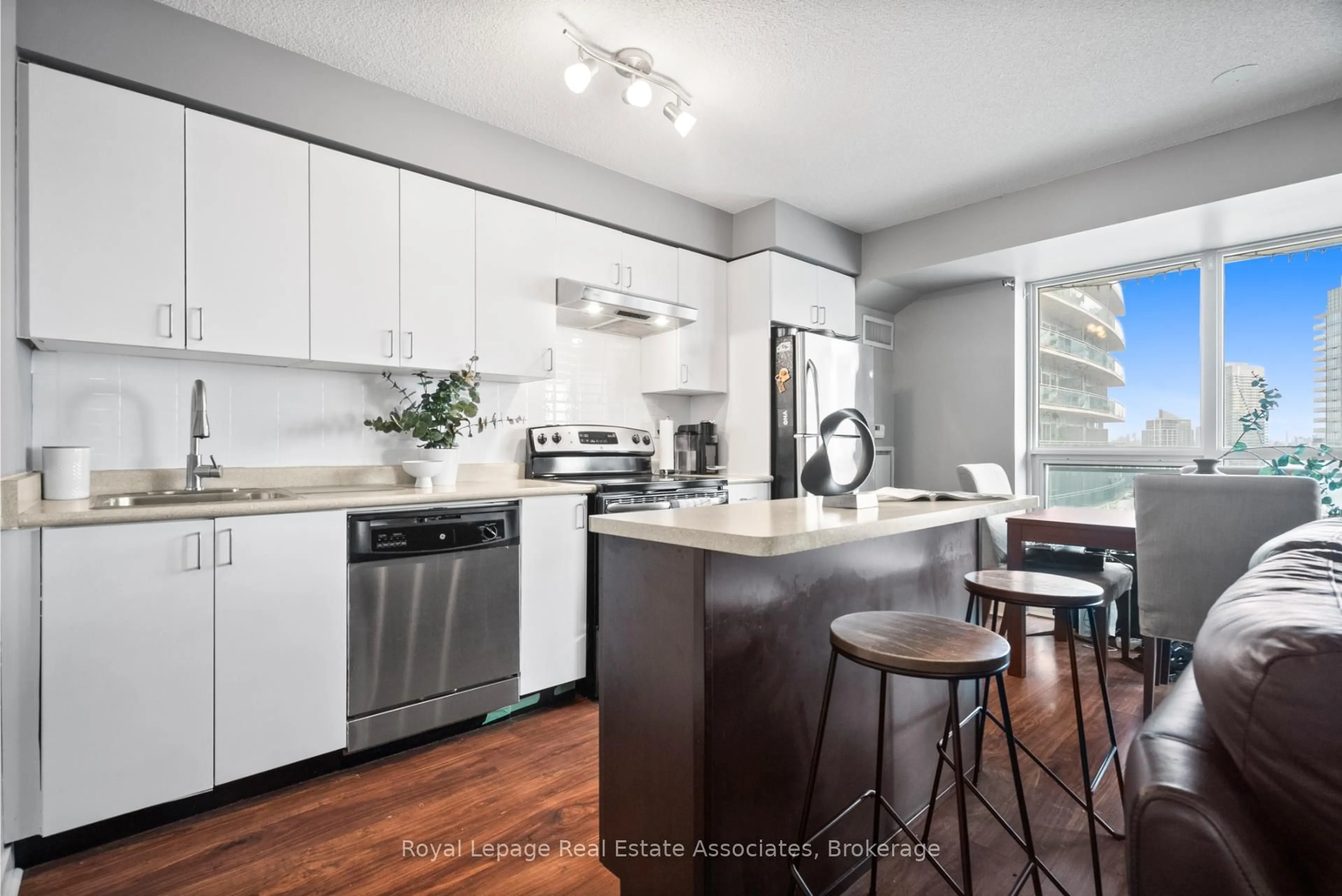 Open concept kitchen, wood/laminate floor for 155 Legion Rd #1601, Toronto Ontario M8Y 0A7