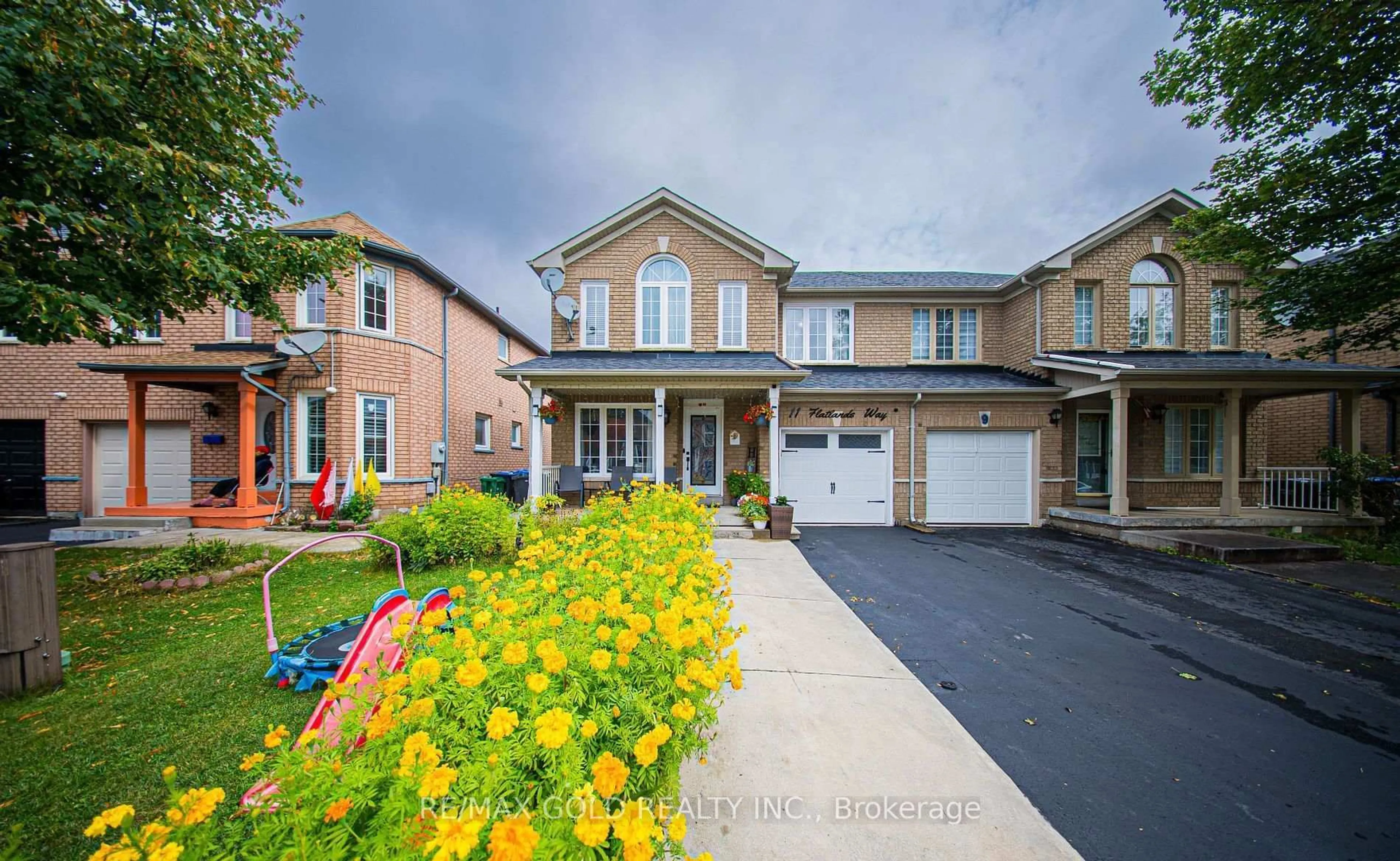 Home with brick exterior material, street for 11 Flatlands Way, Brampton Ontario L6R 2B5