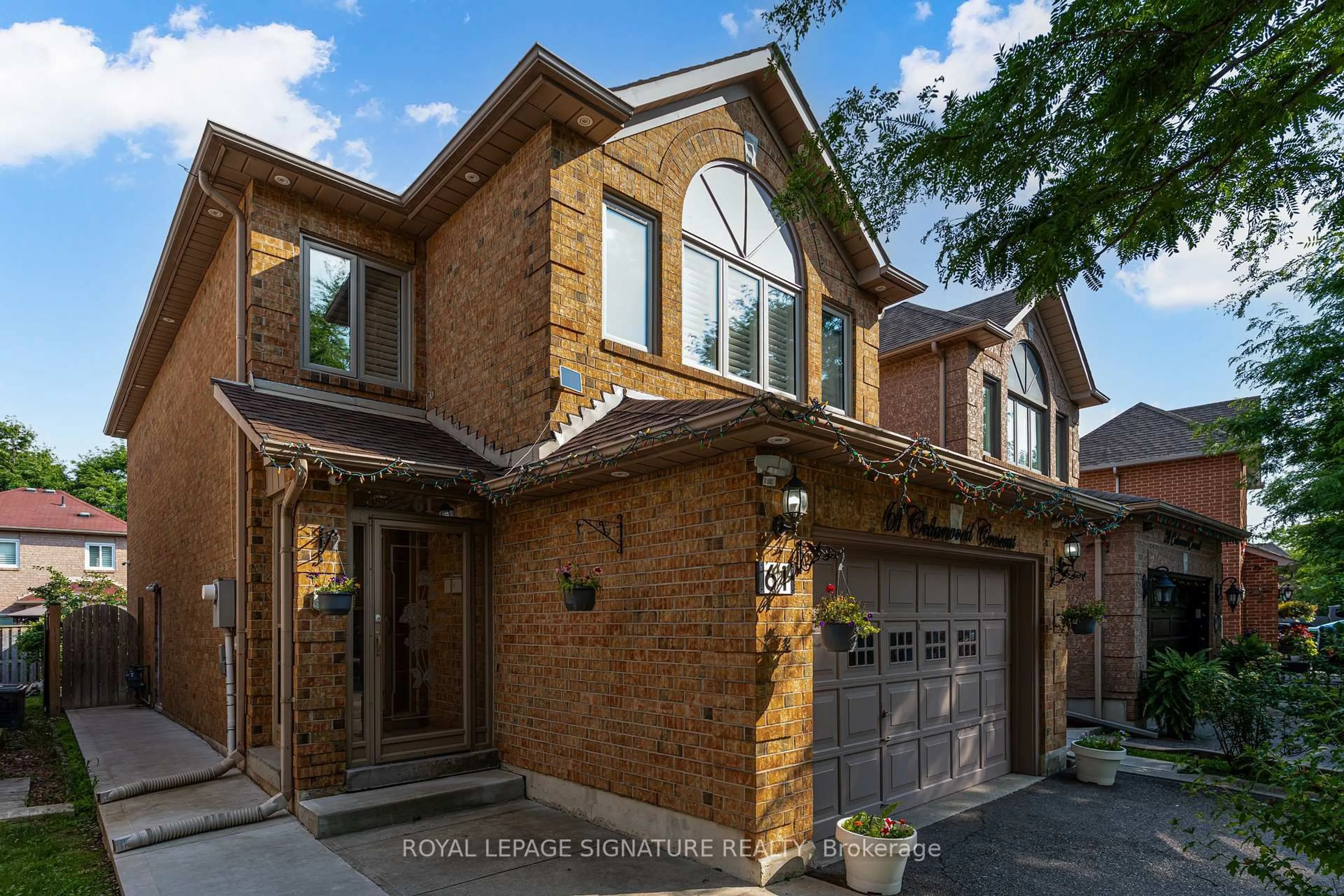 Home with brick exterior material, street for 61 Cedarwood Cres, Brampton Ontario L6X 4J9