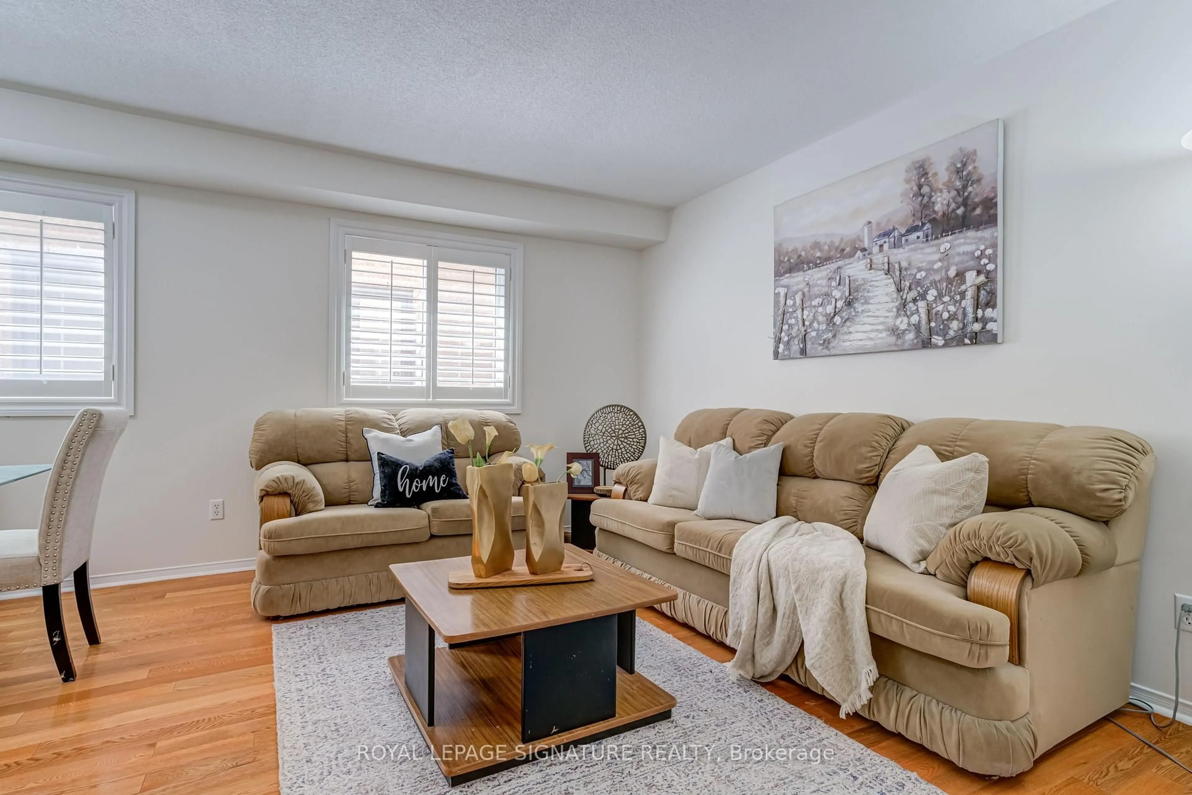 Living room with furniture, unknown for 61 Cedarwood Cres, Brampton Ontario L6X 4J9