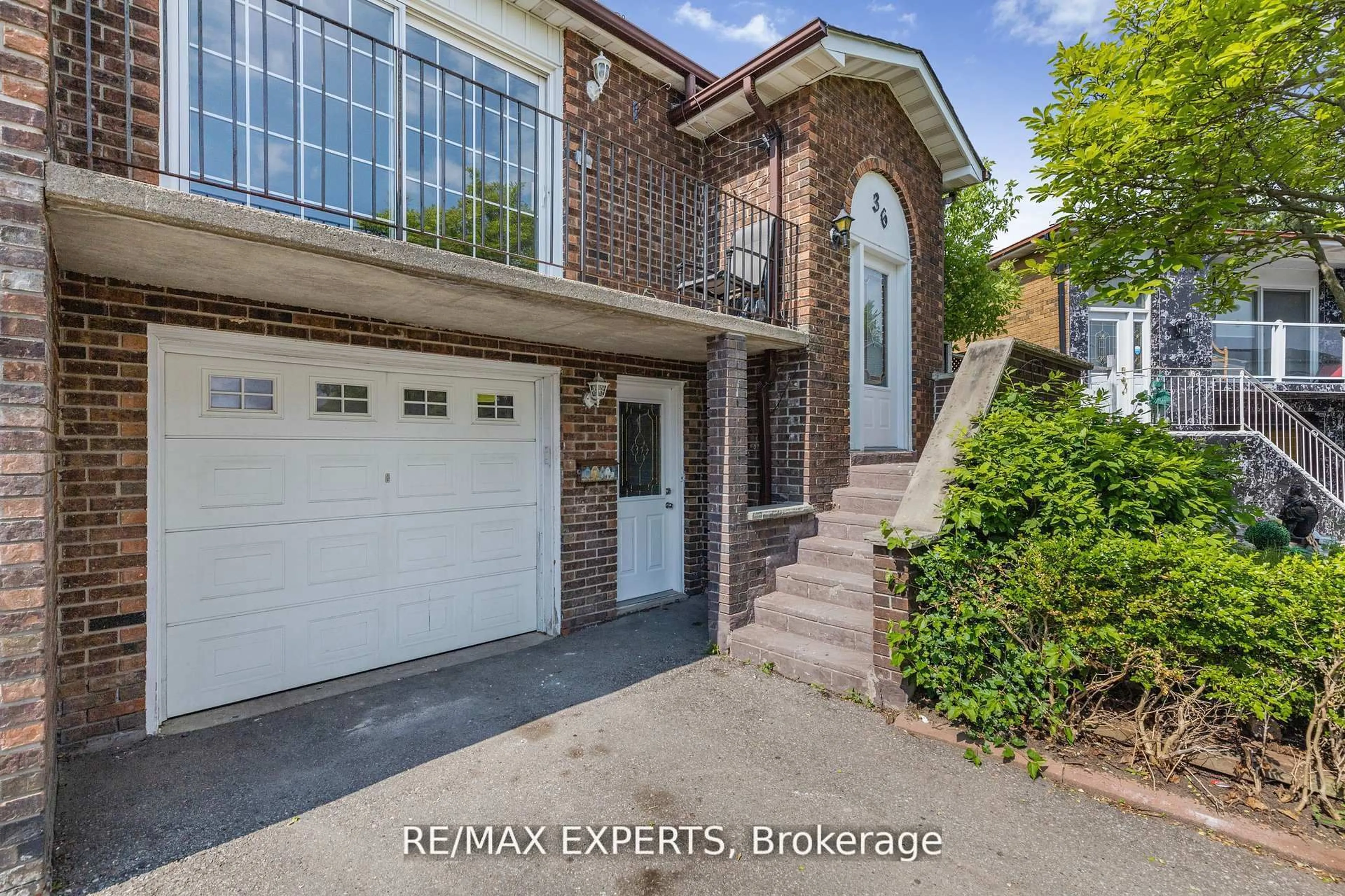 Home with brick exterior material, street for 36 Elderwood Pl, Brampton Ontario L6V 3N3