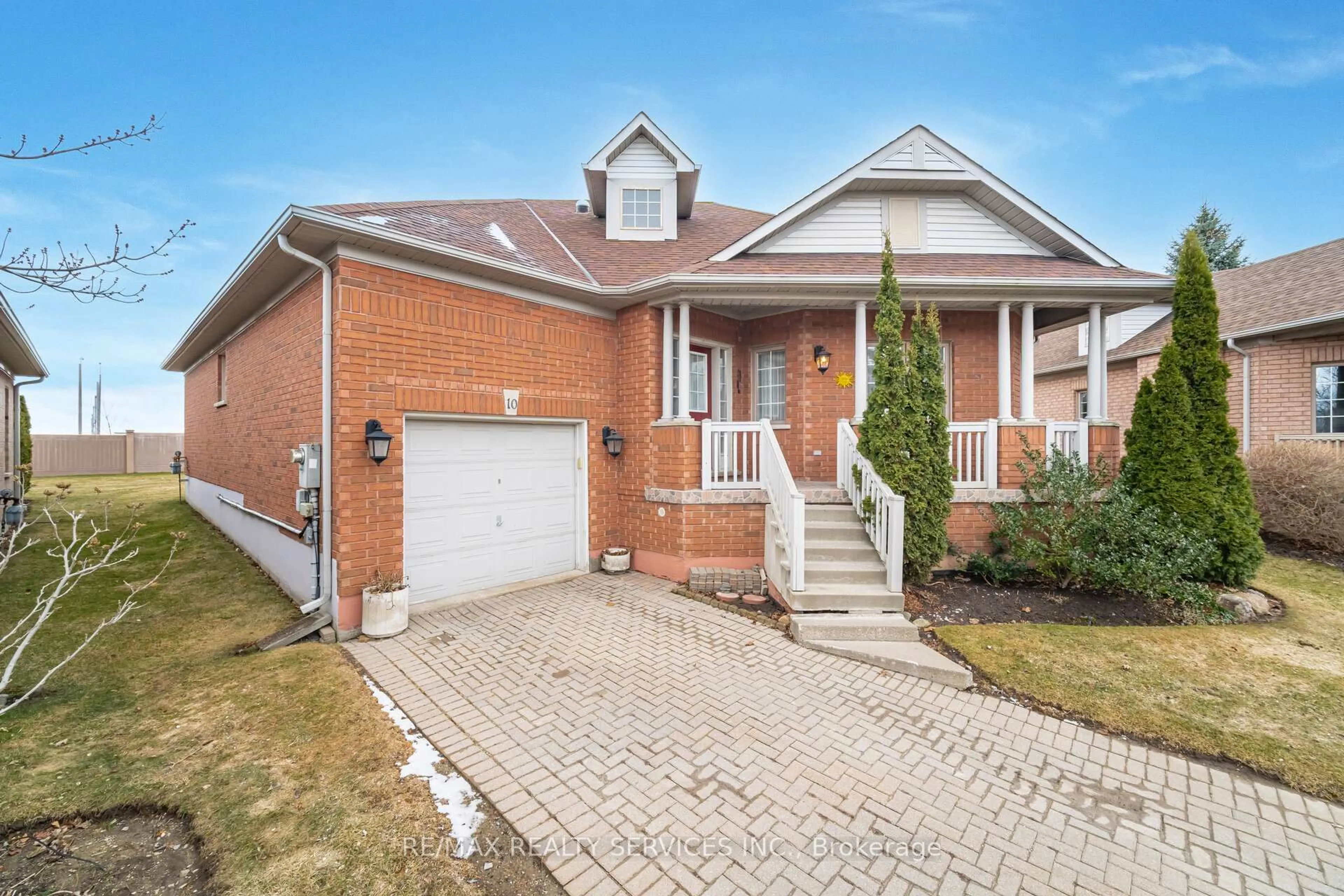 Home with brick exterior material, street for 10 Orchard Park Gate, Brampton Ontario L6R 1W5