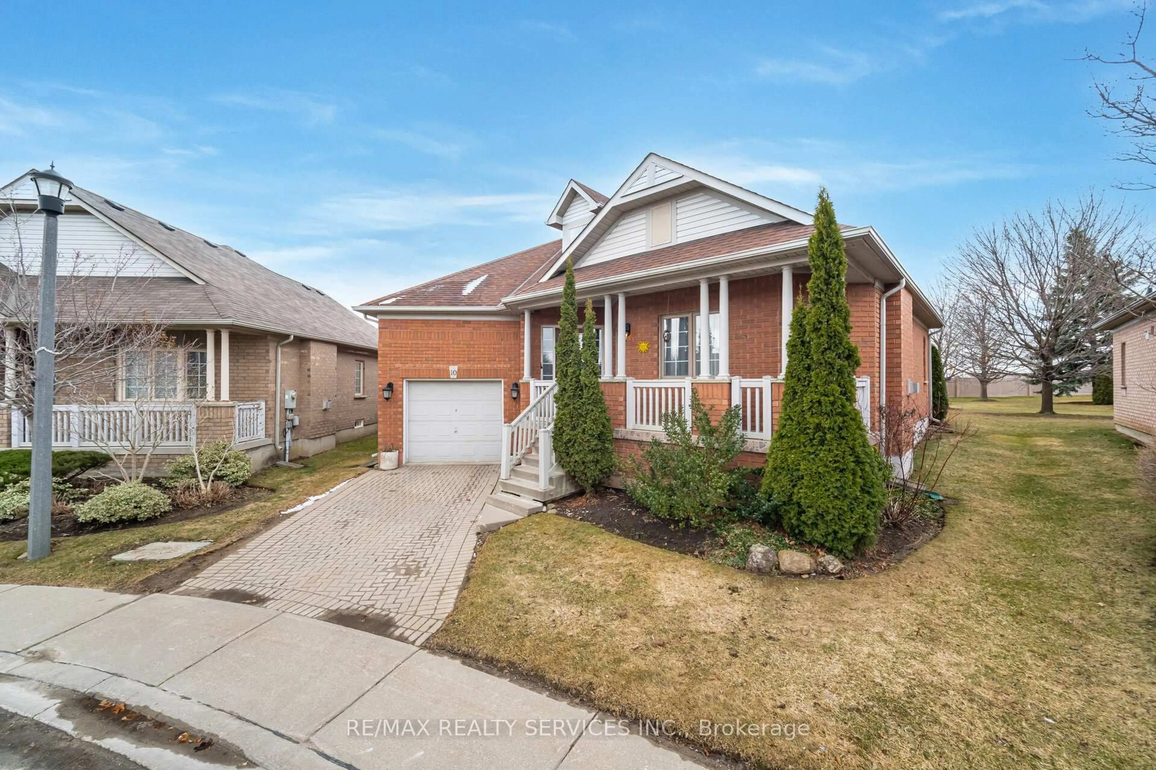 Home with brick exterior material, street for 10 Orchard Park Gate, Brampton Ontario L6R 1W5