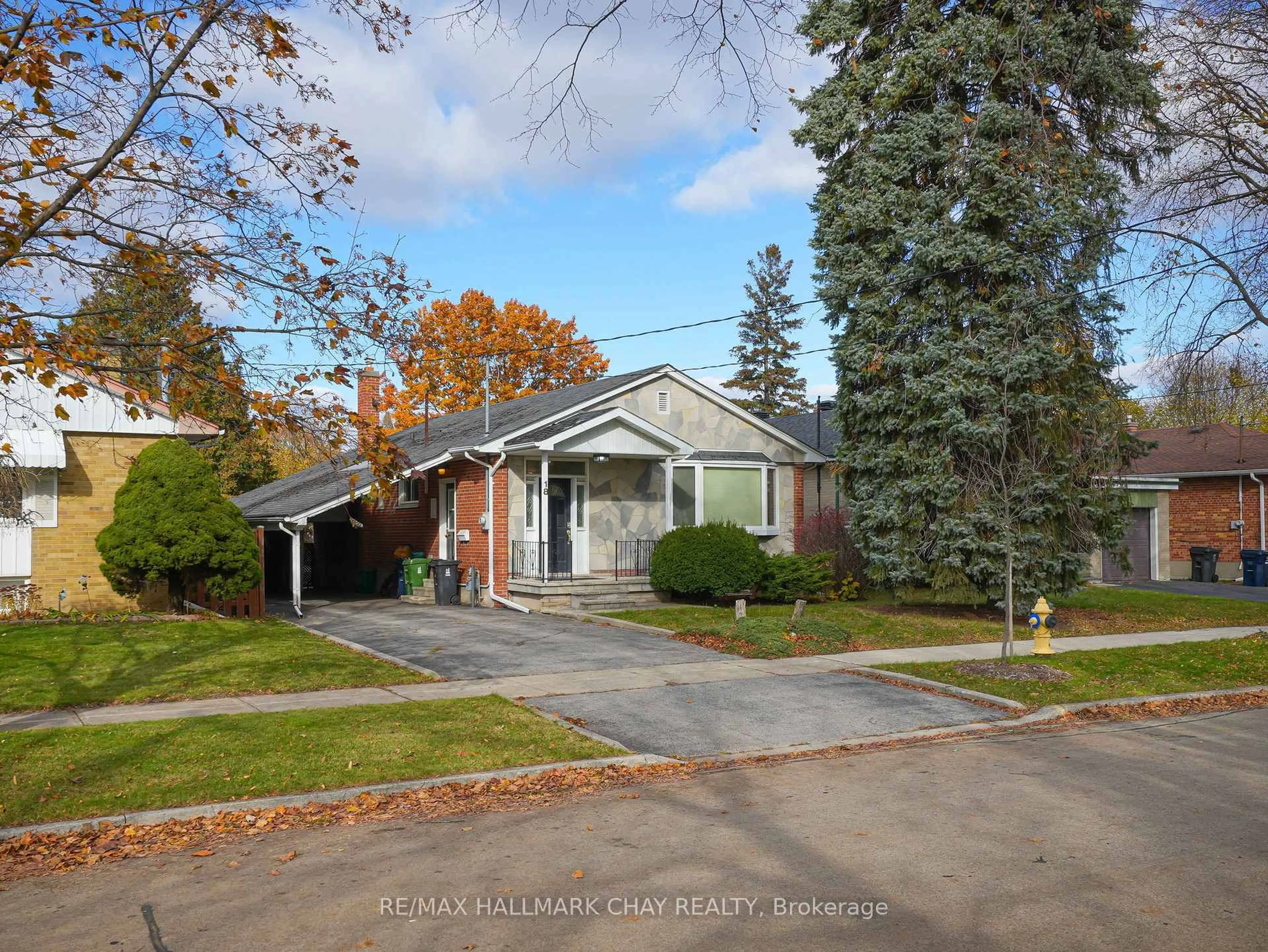 Home with brick exterior material, street for 18 Ludgate Dr, Toronto Ontario M9W 2Y3
