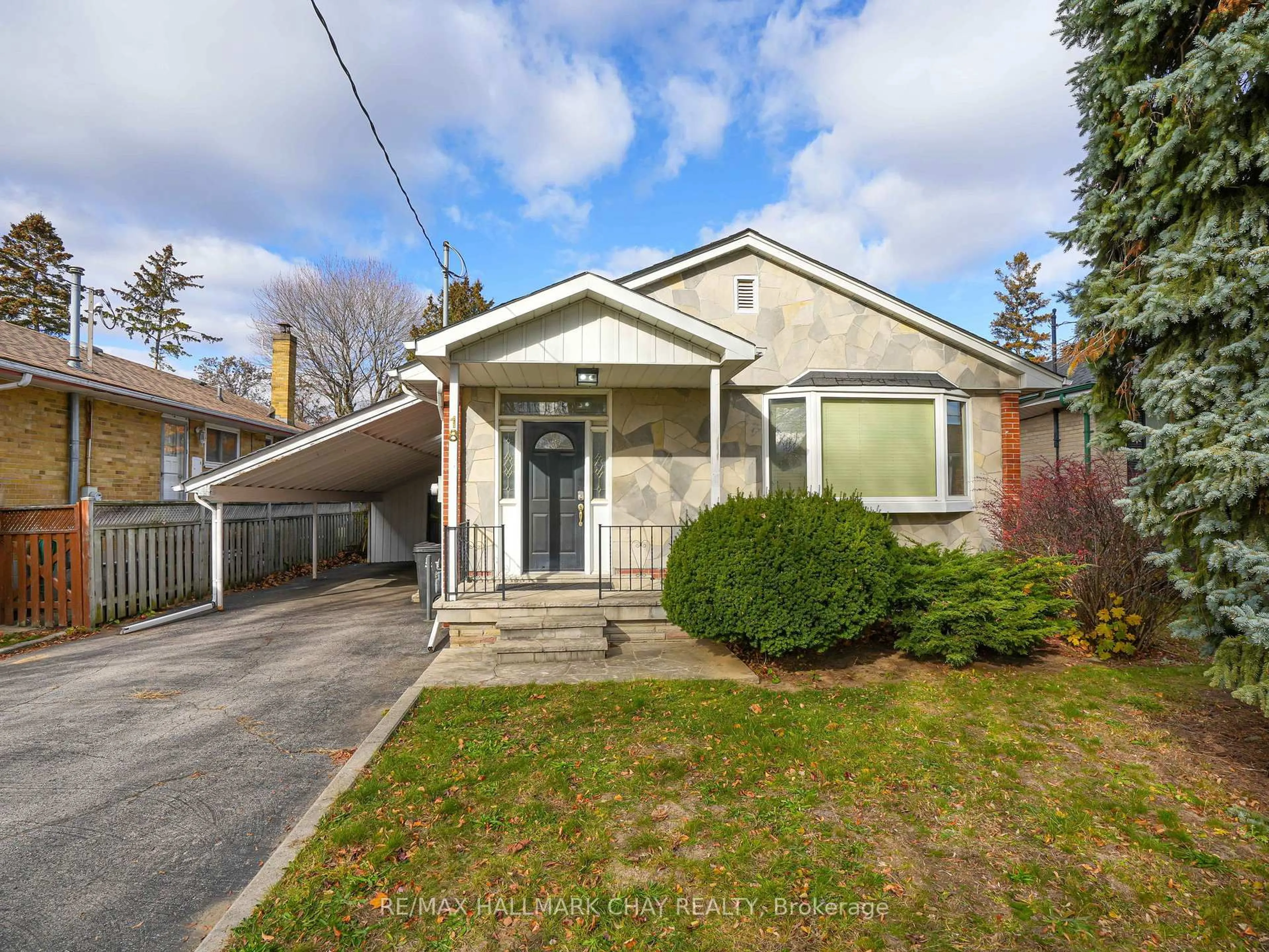 Home with brick exterior material, street for 18 Ludgate Dr, Toronto Ontario M9W 2Y3