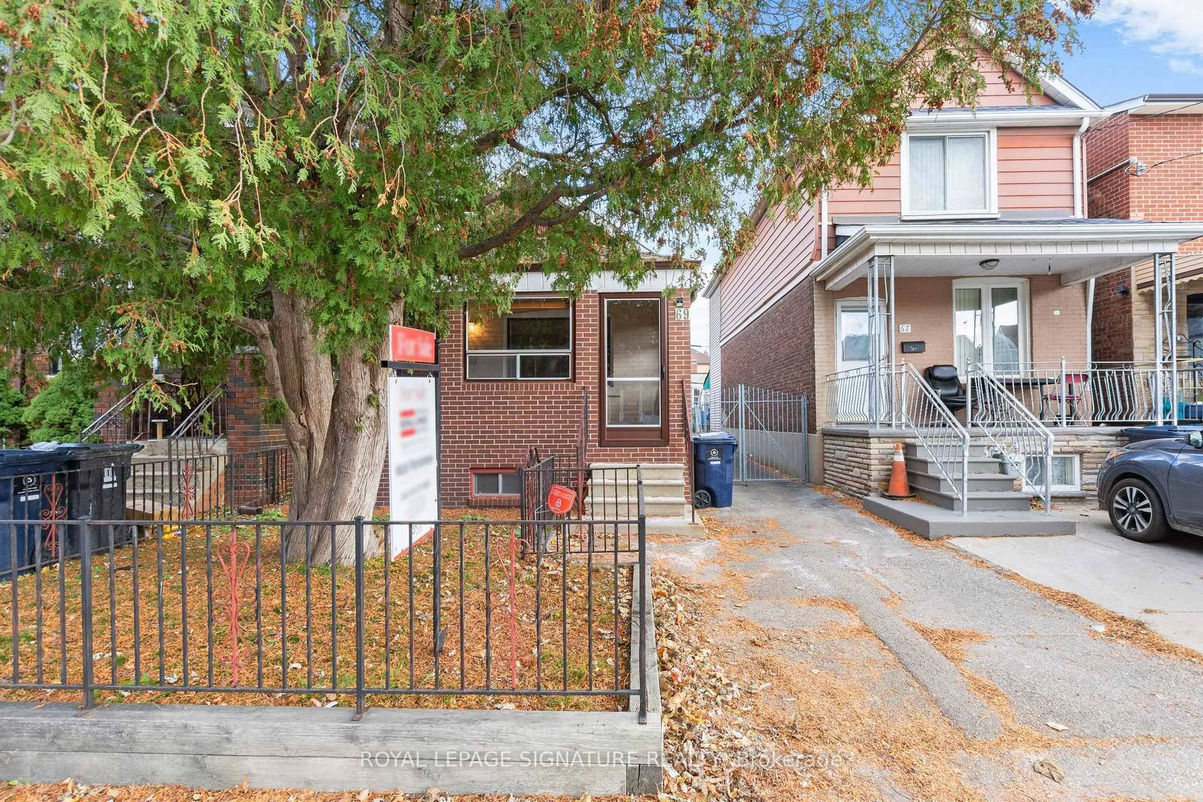 Home with brick exterior material, street for 69 Chambers Ave, Toronto Ontario M6N 3M1