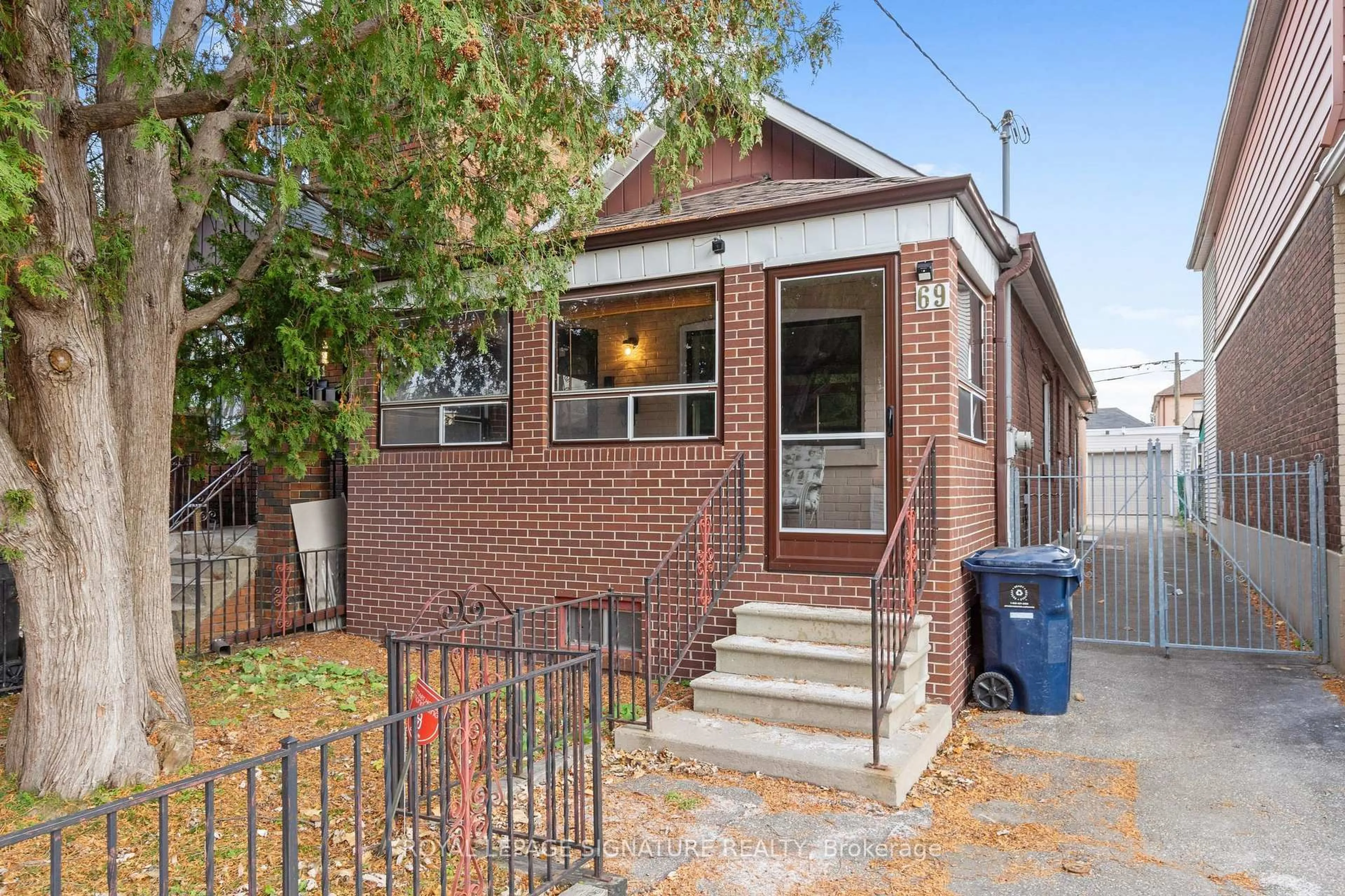 Home with brick exterior material, street for 69 Chambers Ave, Toronto Ontario M6N 3M1
