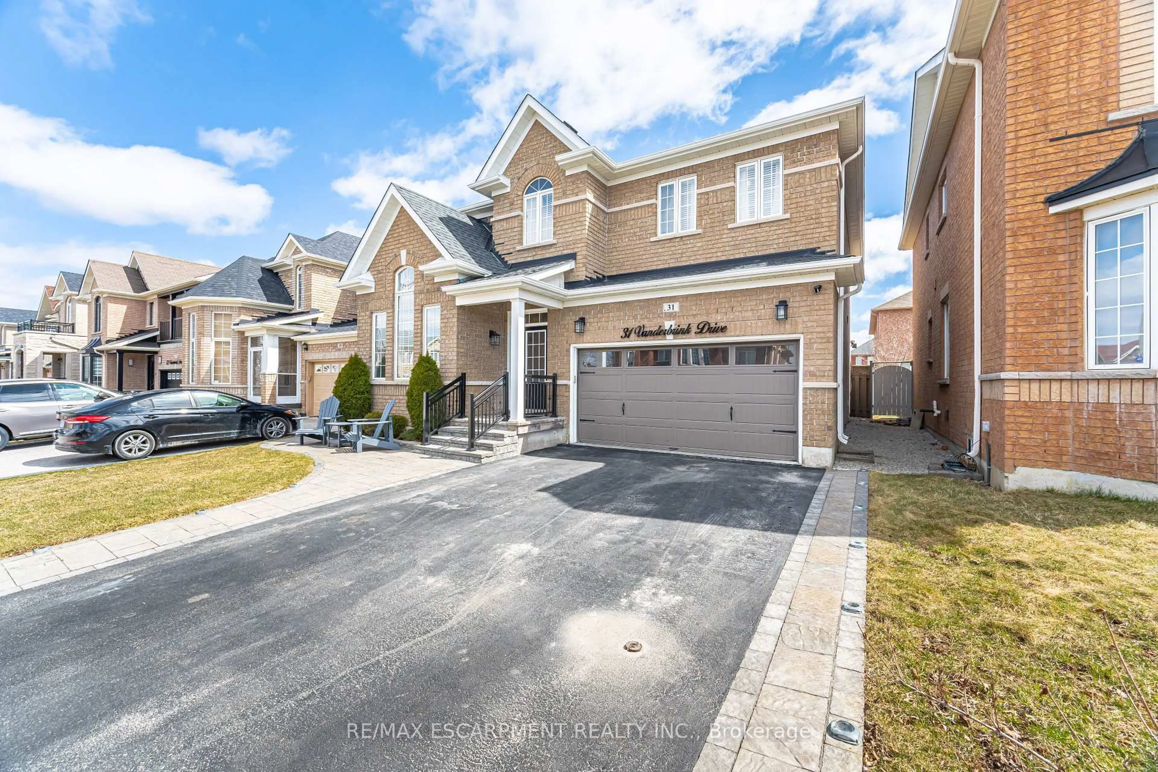 Home with brick exterior material, street for 31 Vanderbrink Dr, Brampton Ontario L6R 0E6