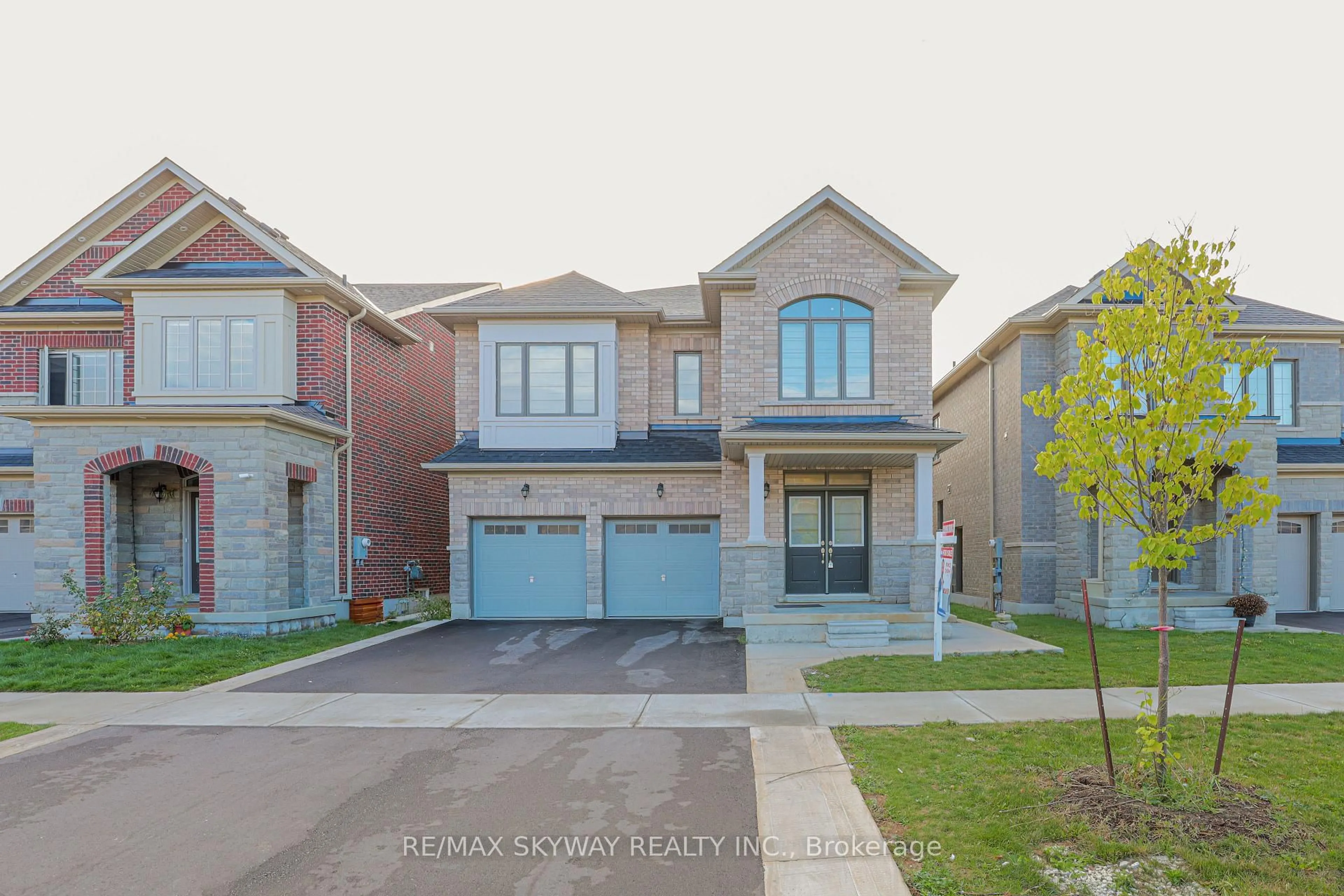 Home with brick exterior material, street for 379 Valleyway Dr, Brampton Ontario L6X 5S7