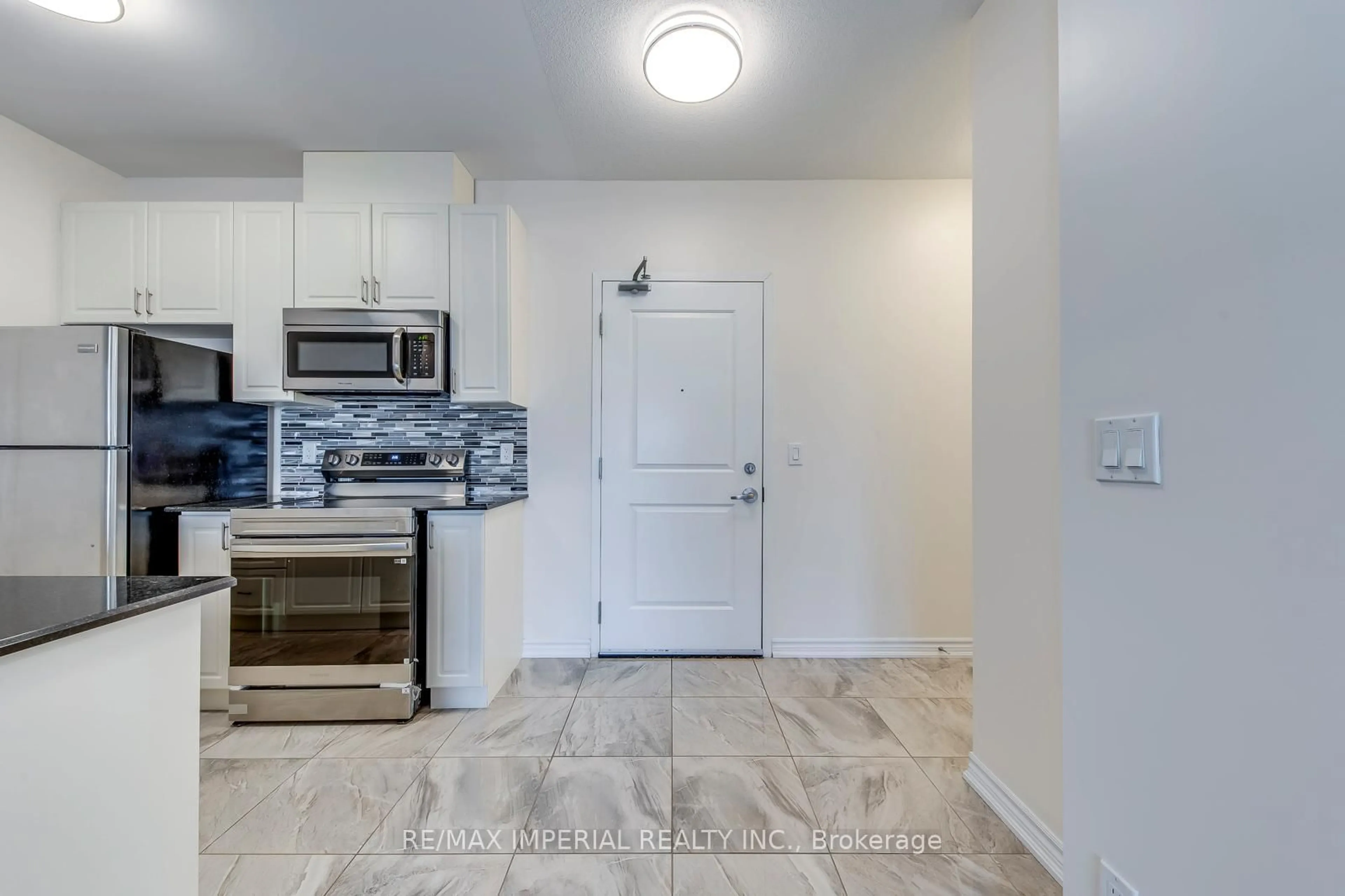 Standard kitchen, ceramic/tile floor for 1360 Costigan Rd #309, Milton Ontario L9T 0Y8