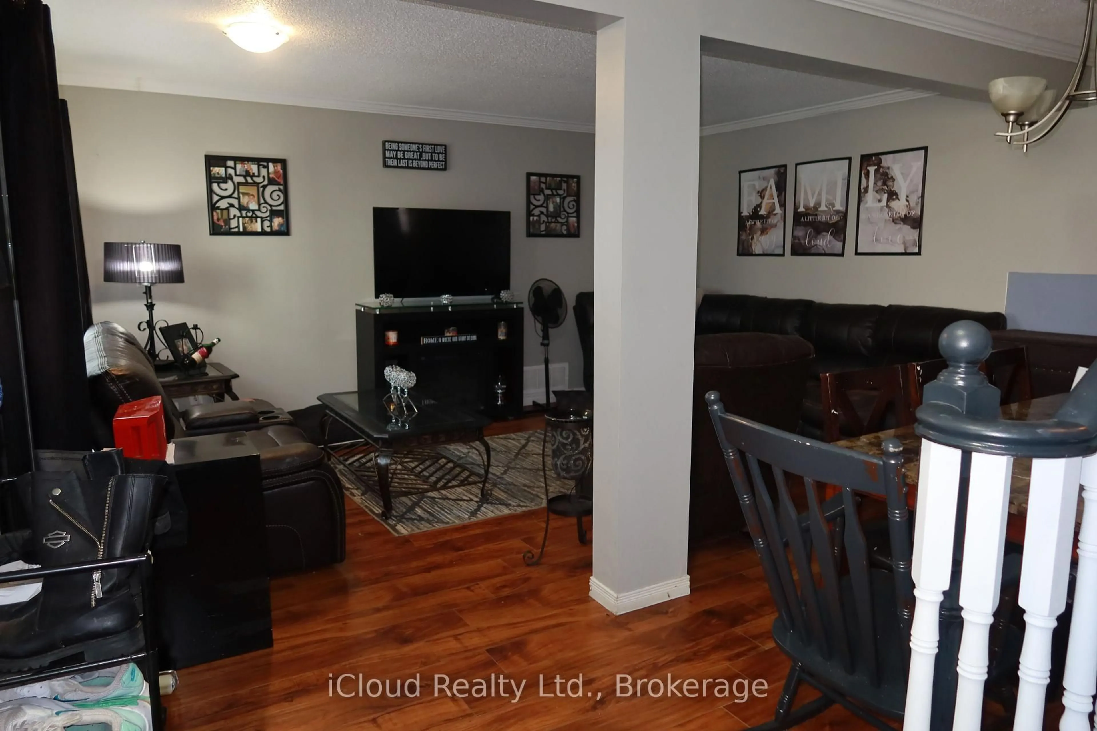 Living room with furniture, wood/laminate floor for 9 Hazelglen Crt, Brampton Ontario L6S 1N7