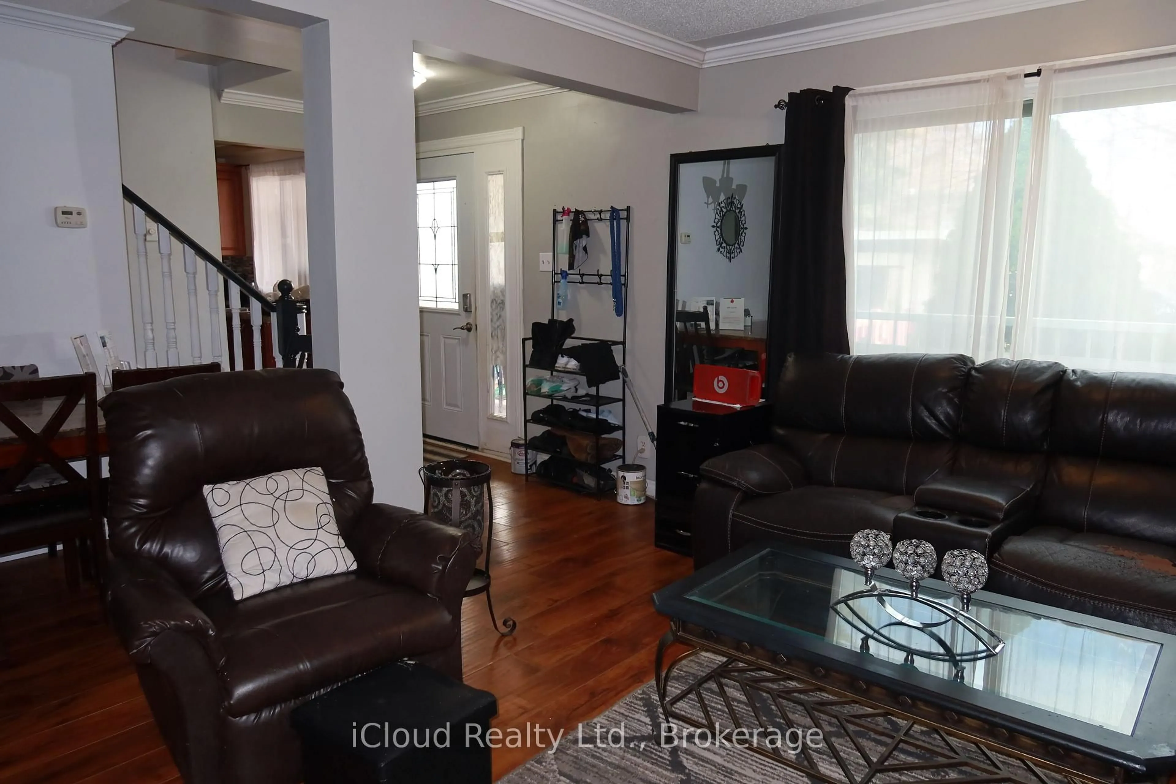 Living room with furniture, wood/laminate floor for 9 Hazelglen Crt, Brampton Ontario L6S 1N7