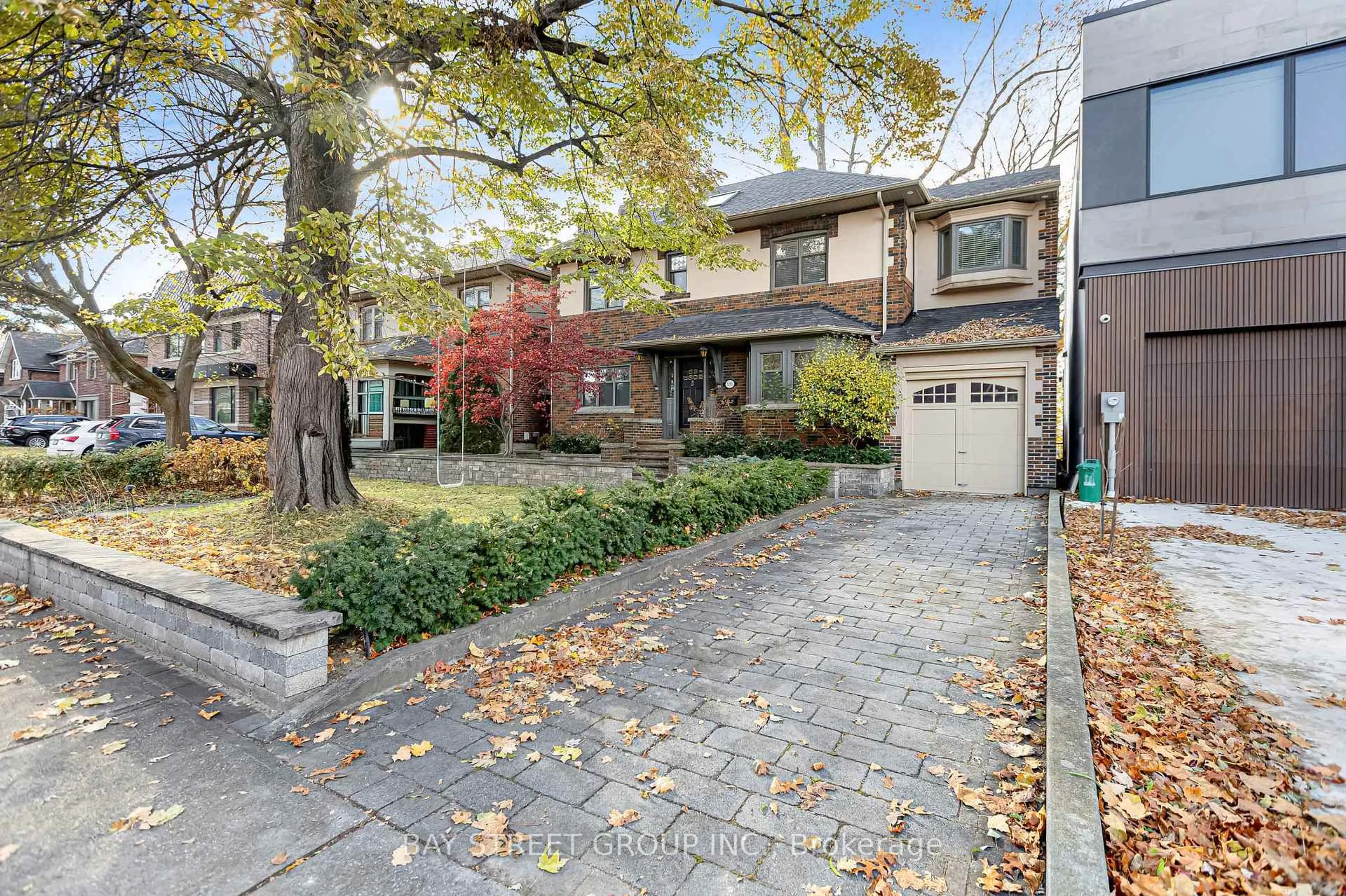 Home with brick exterior material, street for 136 Humbercrest Blvd, Toronto Ontario M6S 4L3