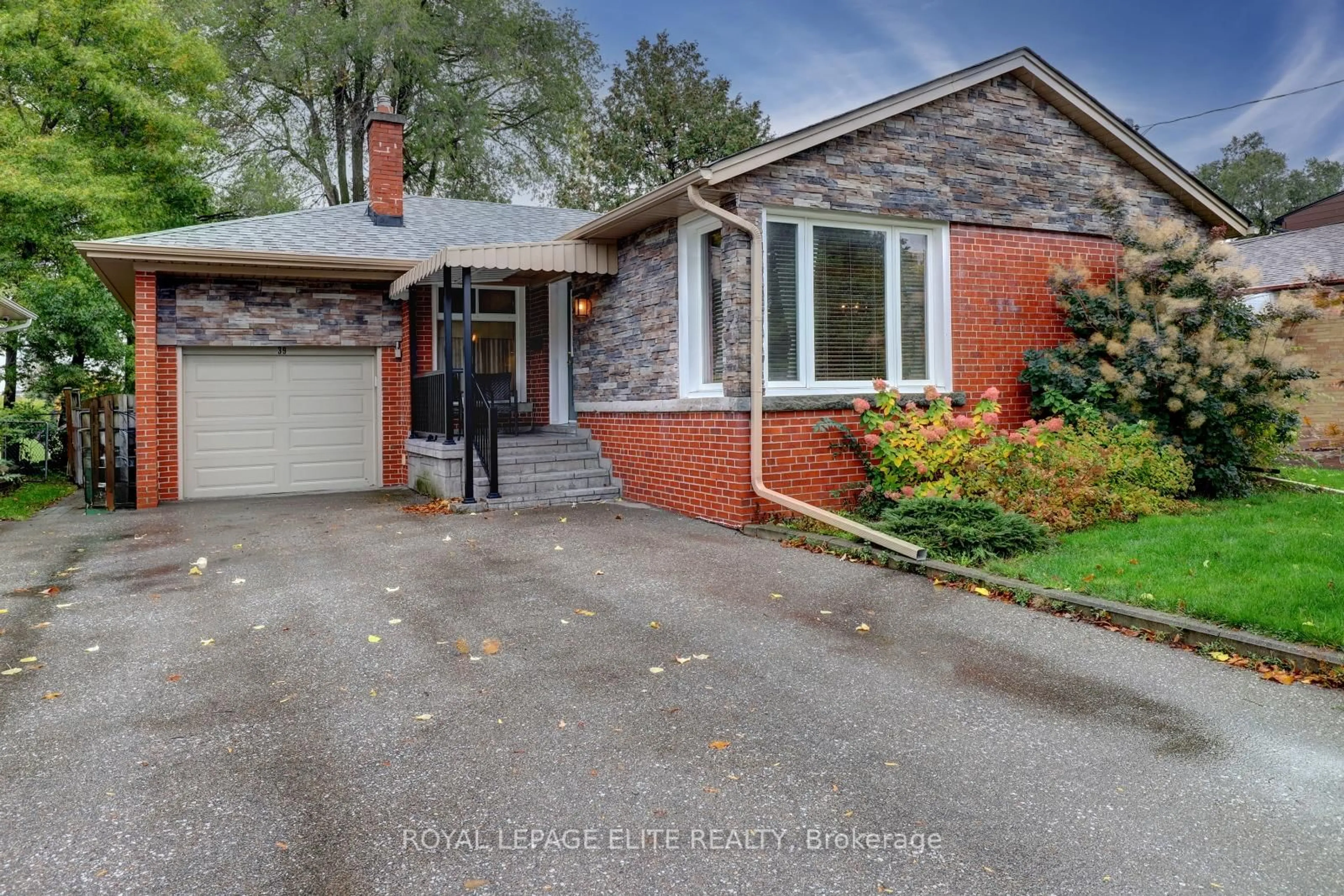 Home with brick exterior material, street for 39 Sealcove Dr, Toronto Ontario M9C 2C7