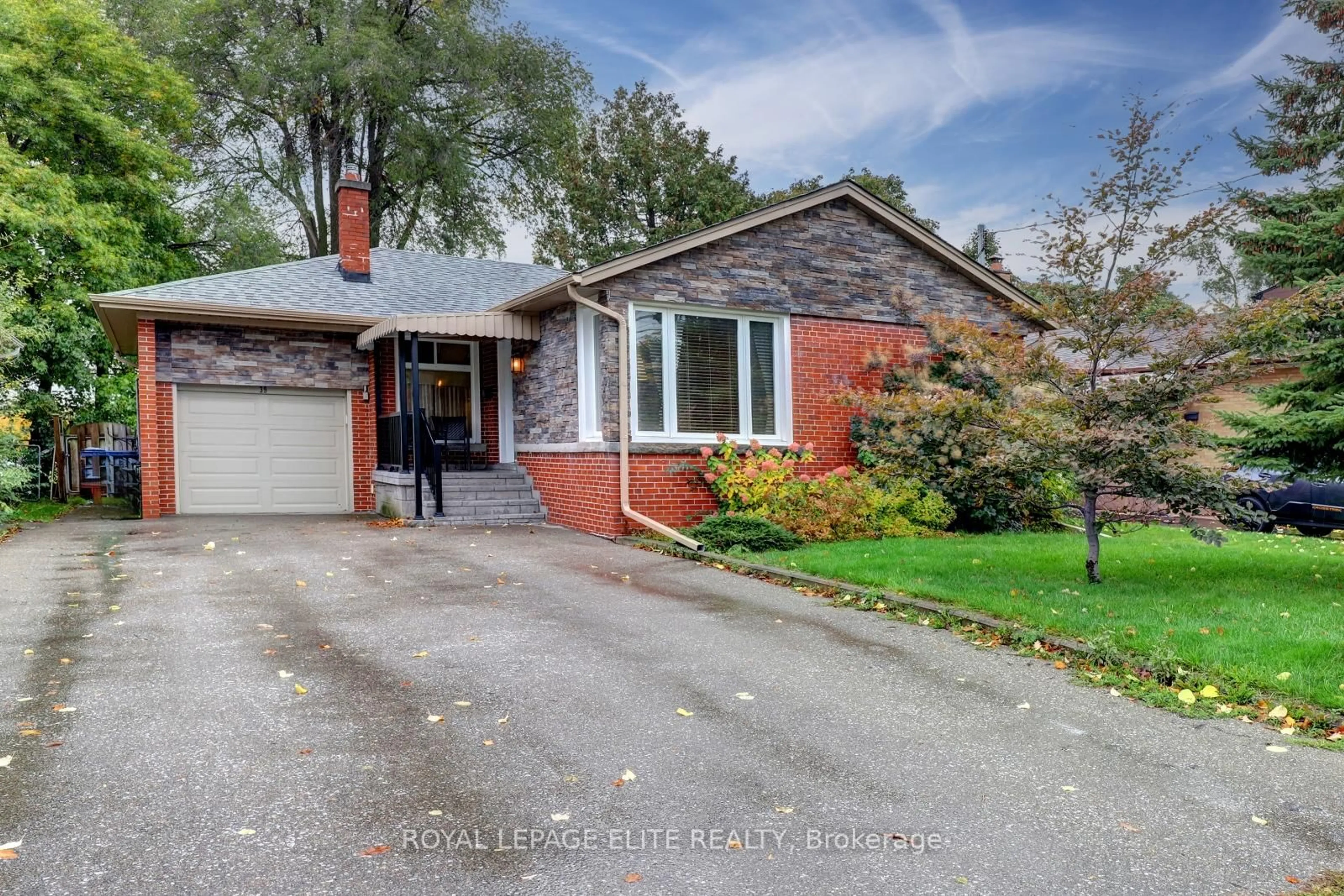 Home with brick exterior material, street for 39 Sealcove Dr, Toronto Ontario M9C 2C7