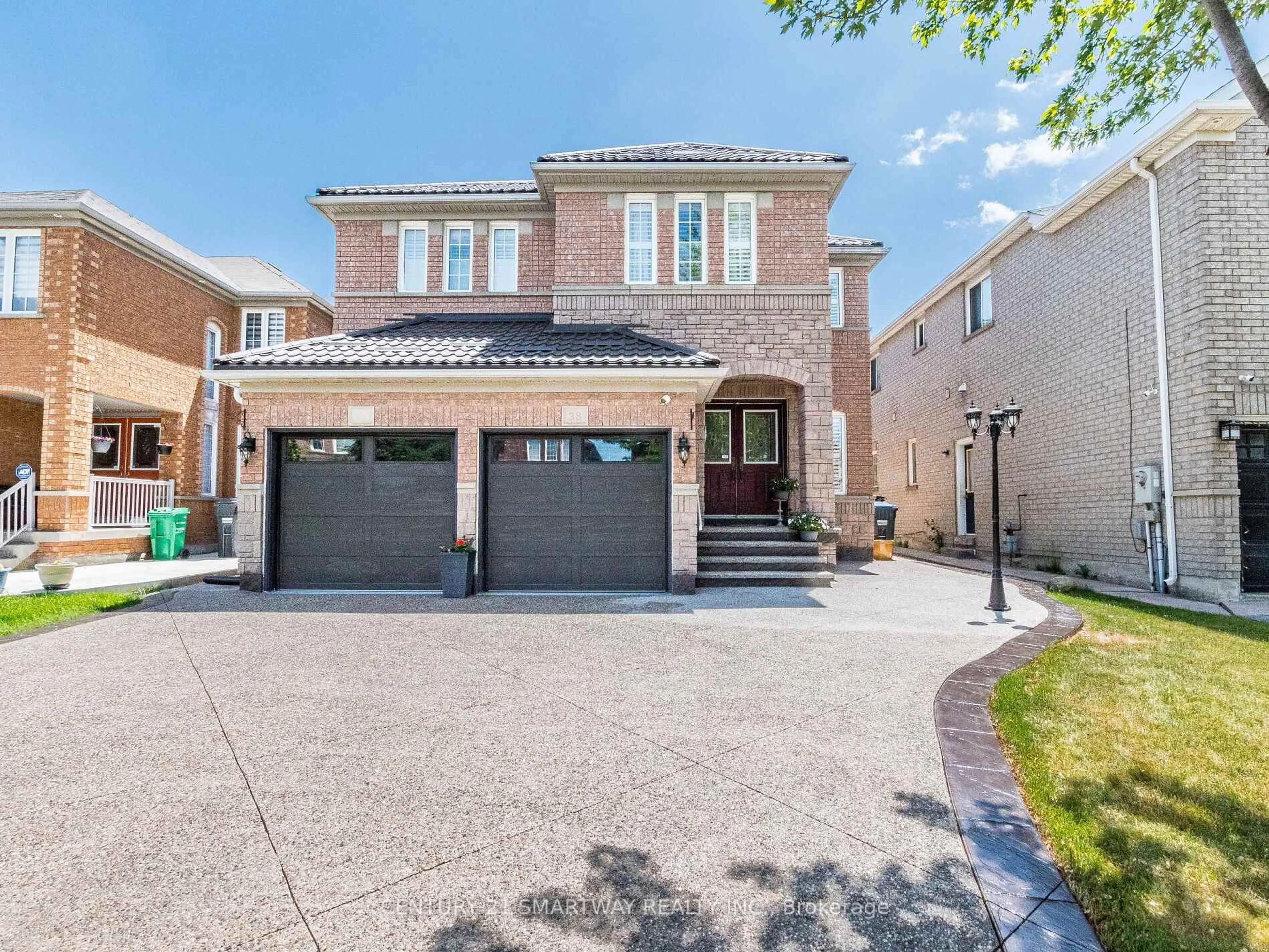 Home with brick exterior material, street for 38 Bottlebrush Dr, Brampton Ontario L6R 2Z5