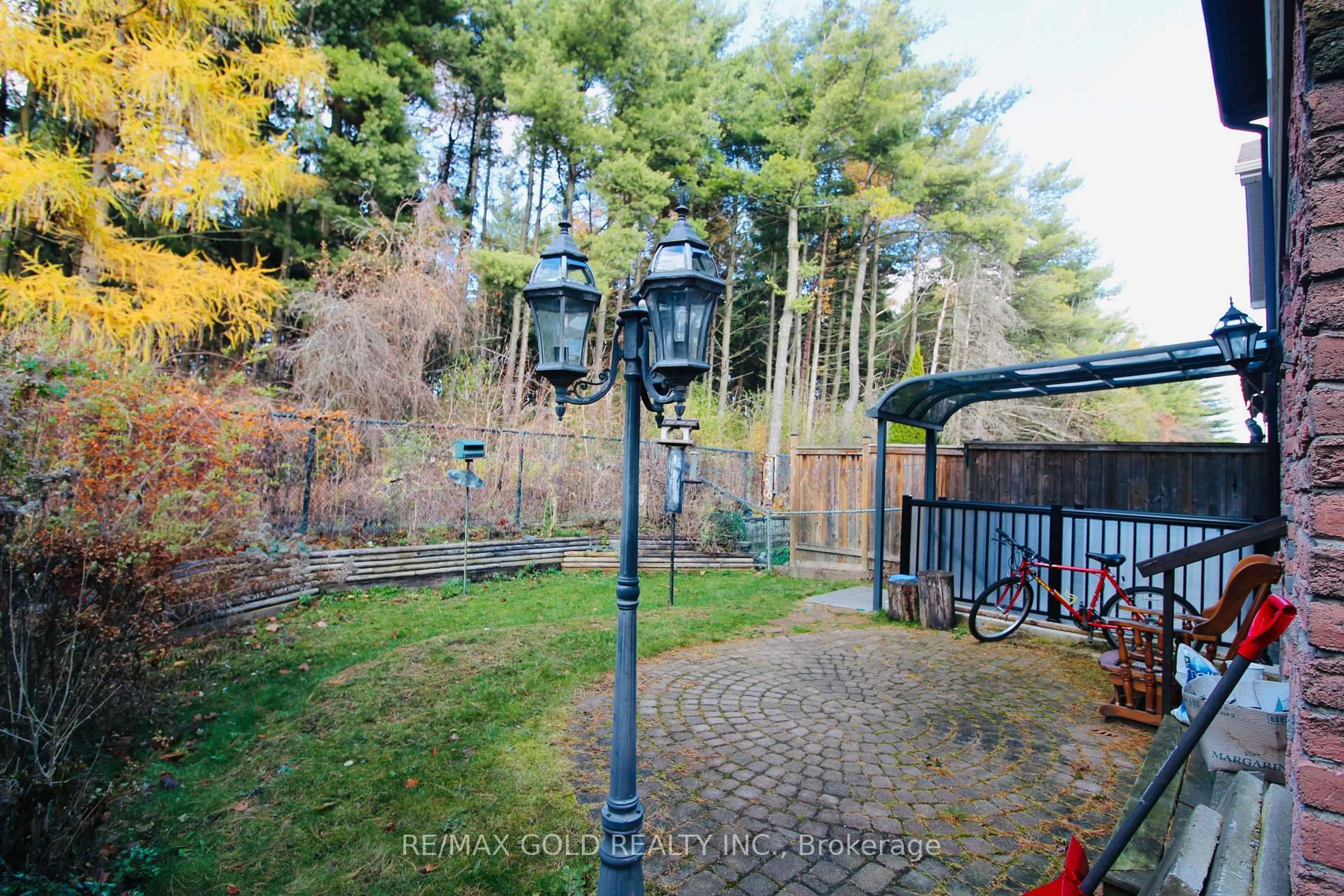 A pic from outside/outdoor area/front of a property/back of a property/a pic from drone, forest/trees view for 100 rawling Cres, Brampton Ontario L6Z 1N8