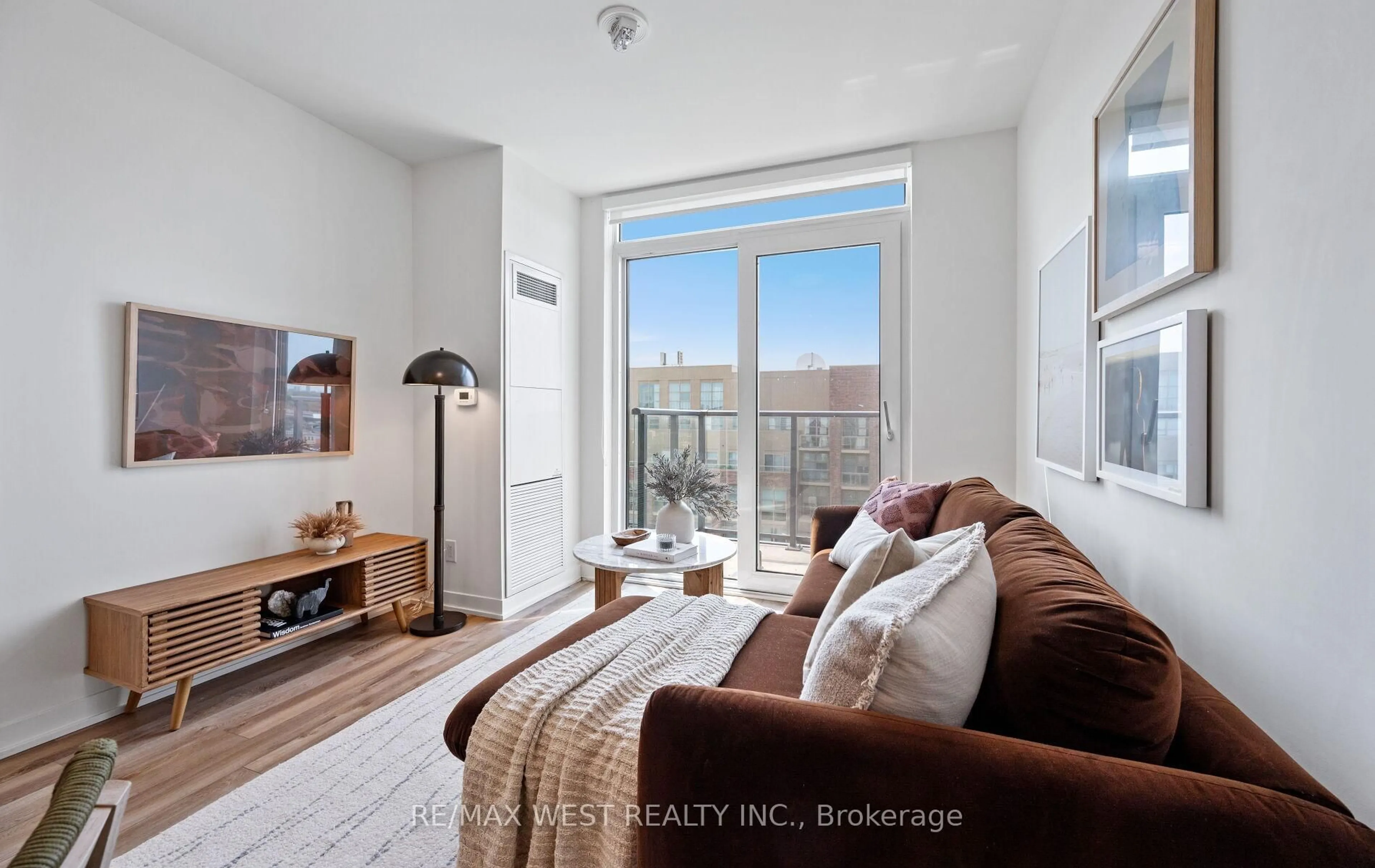 Living room with furniture, wood/laminate floor for 1808 St Clair Ave #1103, Toronto Ontario M6N 0C1