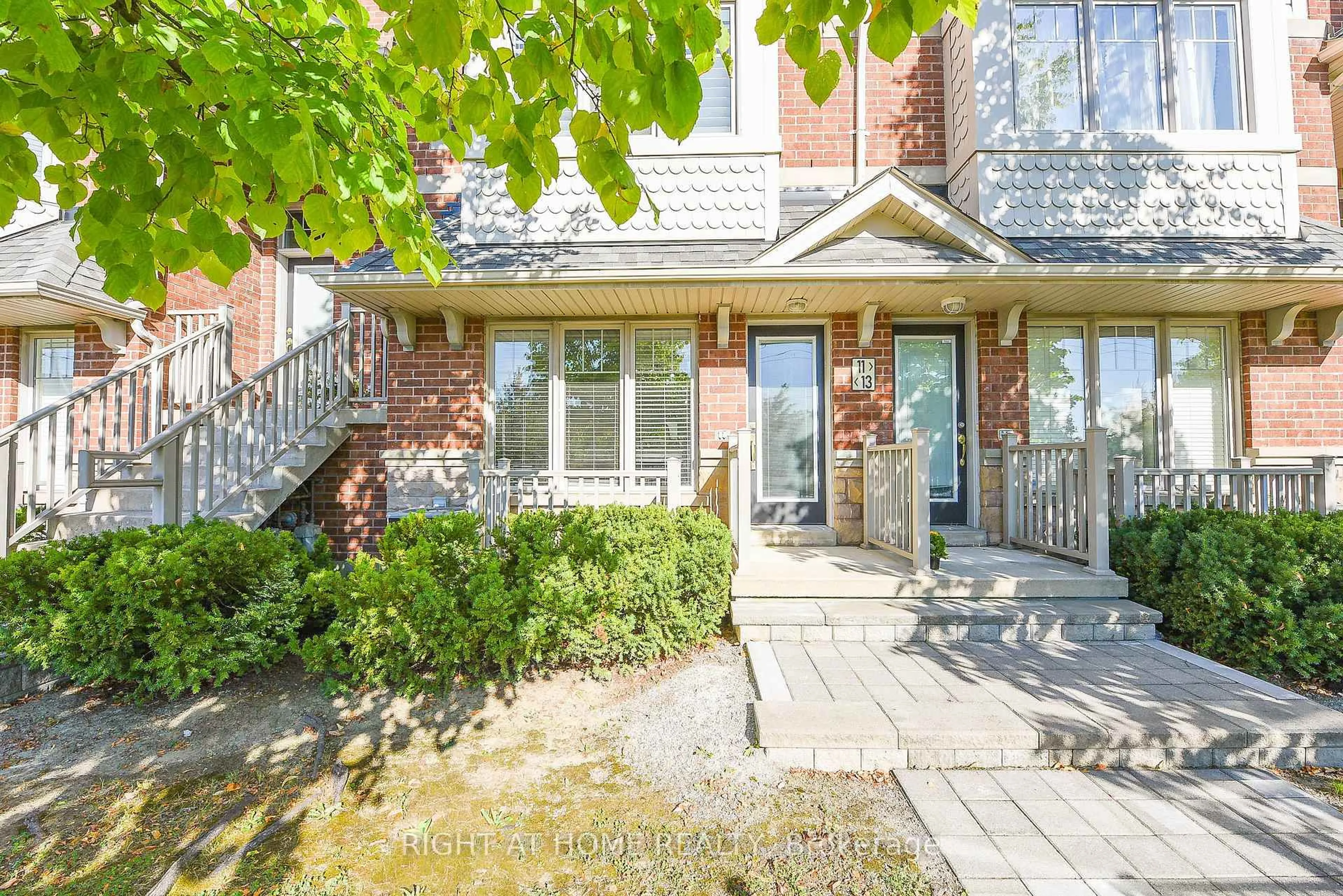 Home with brick exterior material, street for 3335 Thomas St #13, Mississauga Ontario L5M 0N7