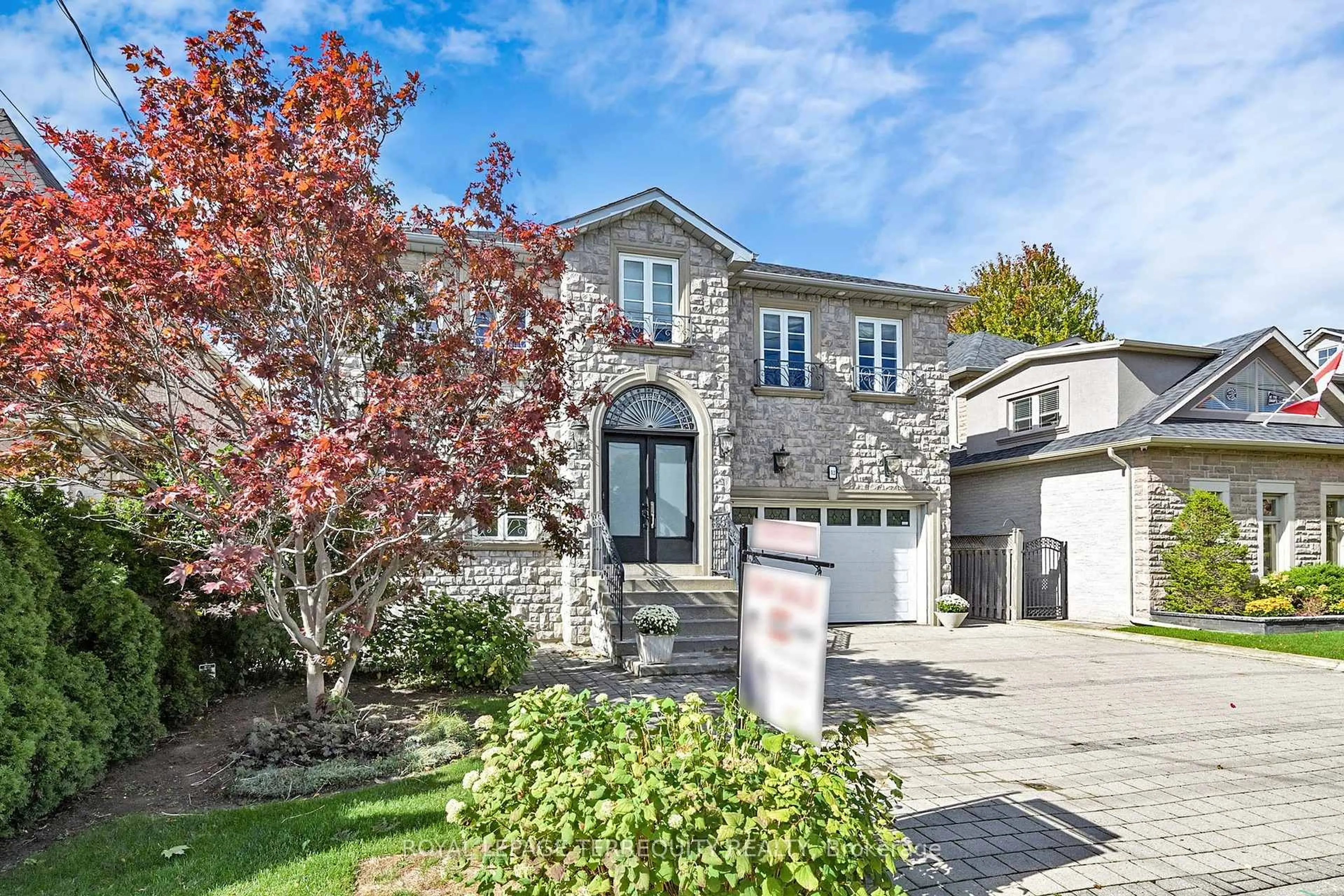 Home with brick exterior material, street for 12 Highland Hill, Toronto Ontario M6A 2P8