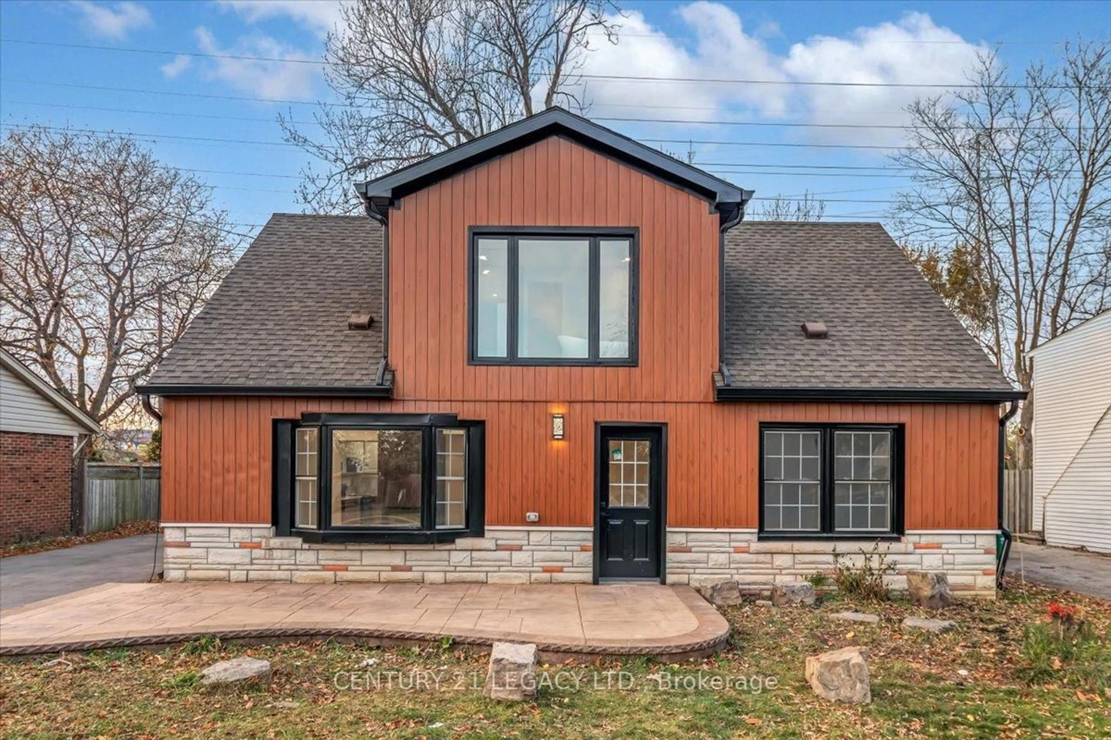 Home with brick exterior material, unknown for 2027 Churchill Ave, Burlington Ontario L7R 3T8